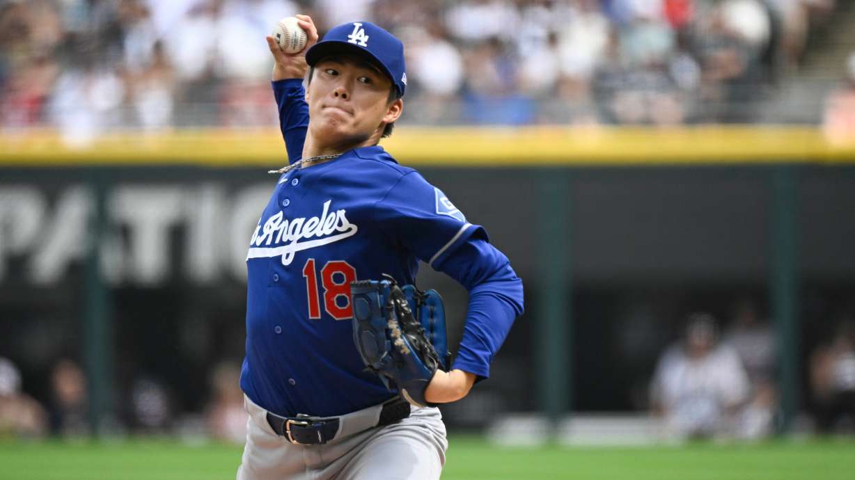 Los Angeles Dodgers pitcher Yoshinobu Yamamoto, of Japan, delivers during the first inning of a baseball game against the Chicago White Sox, Saturday, June 13, 2026, in Chicago.