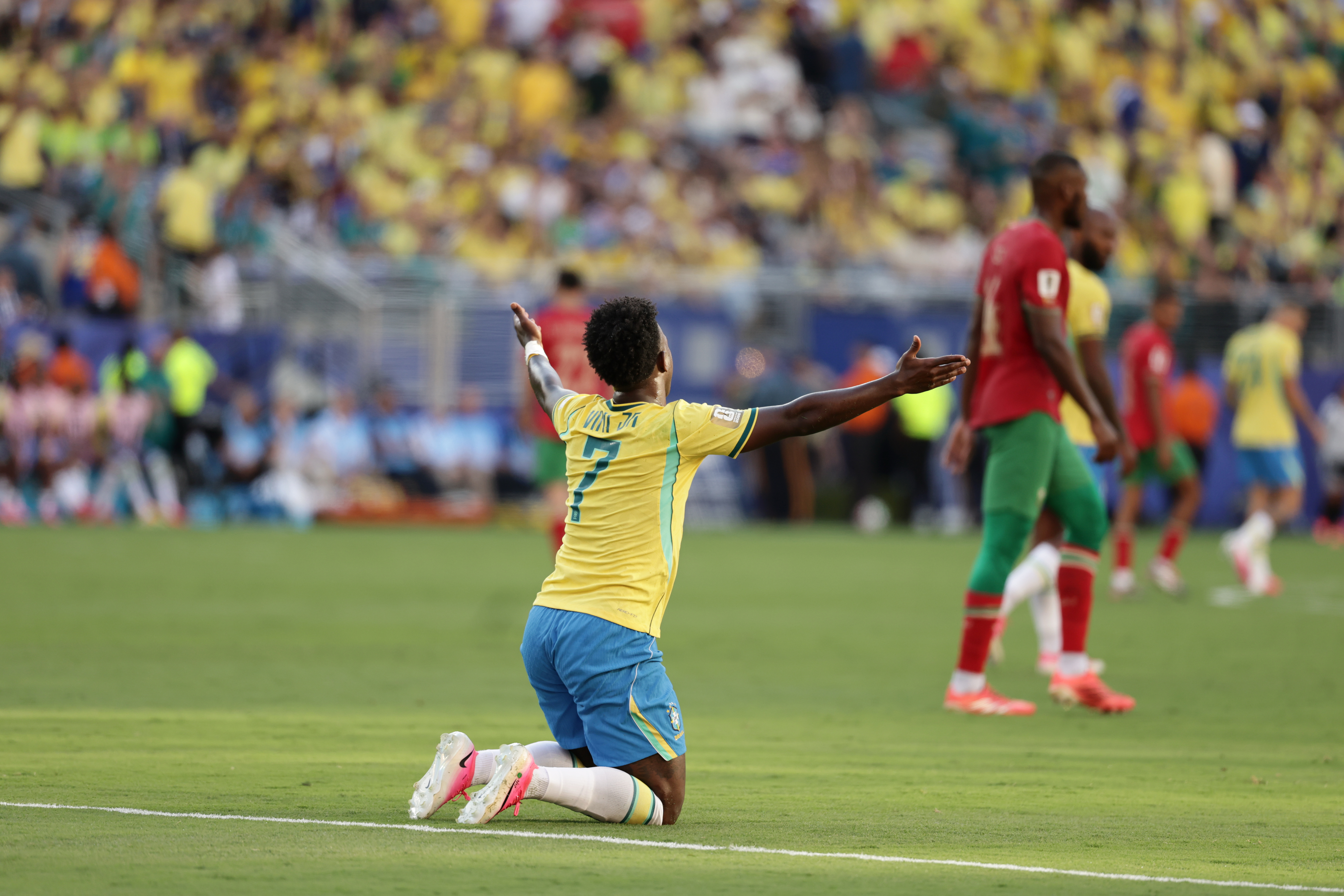 Brazil's Vinicius Junior (7) reacts after being tripped in the first half during the World Cup Group C soccer match between Brazil and Morocco in East Rutherford, N.J., near New York, Saturday, June 13, 2026.