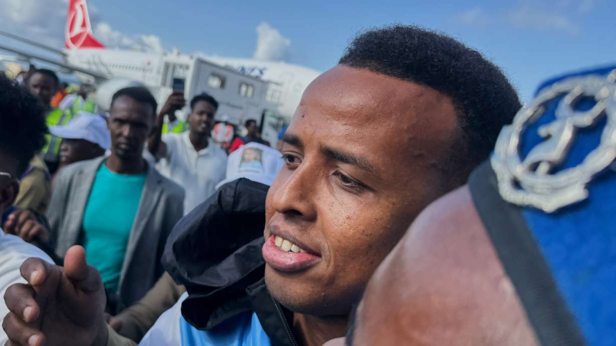 Referee Omar Artan, who was denied entry to the United States, is welcomed by supporters upon his arrival in Mogadishu, Somalia, Wednesday, June 10, 2026.