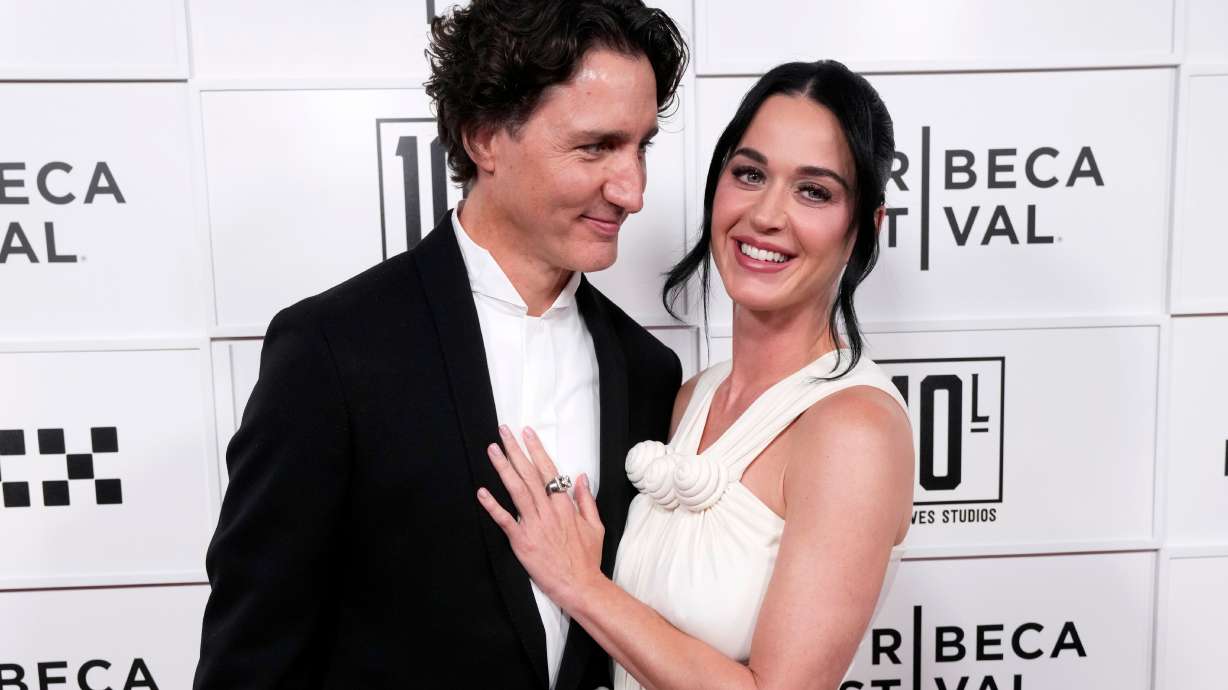 Justin Trudeau, left, and Katy Perry attend the "Katy Perry: The Lifetimes Tour - Live from Paris" world premiere at the OKX Theater at BMCC Tribeca Performing Arts Center during the Tribeca Festival on Monday, May 8, 2026, in New York.