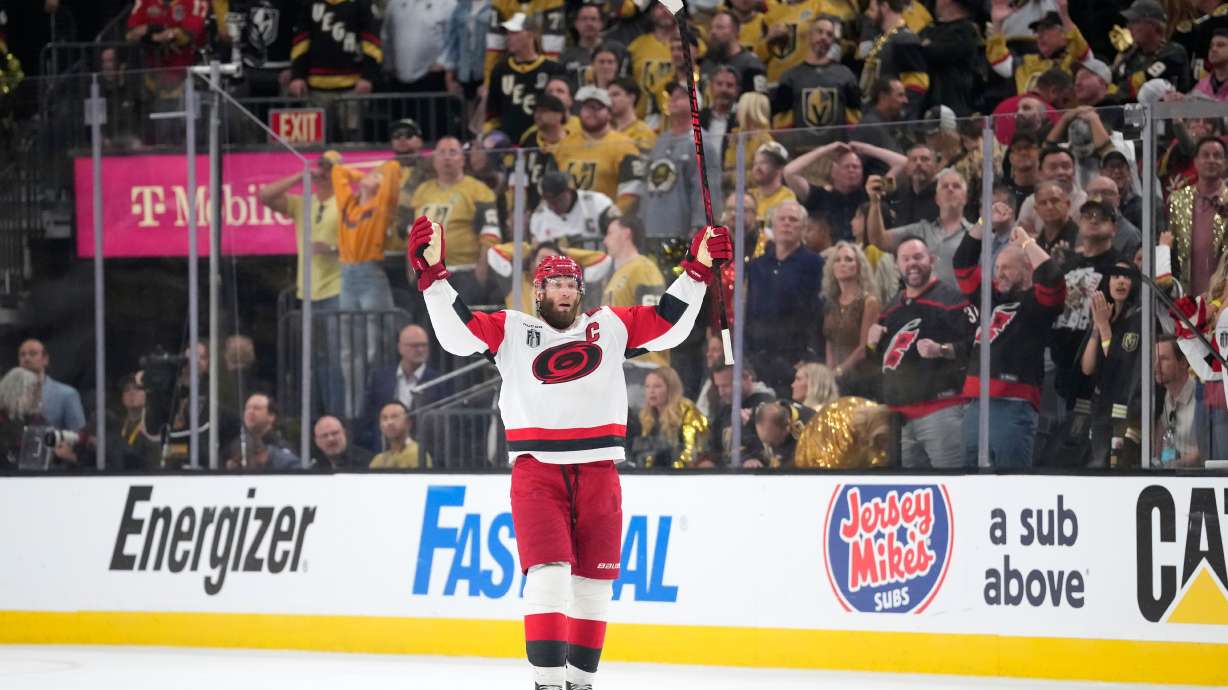Carolina Hurricanes center Jordan Staal celebrates an empty net goal by left wing Nikolaj Ehlers during the third period in Game 4 of the NHL hockey Stanley Cup Final series against the Vegas Golden Knights, Tuesday, June 9, 2026, in Las Vegas.