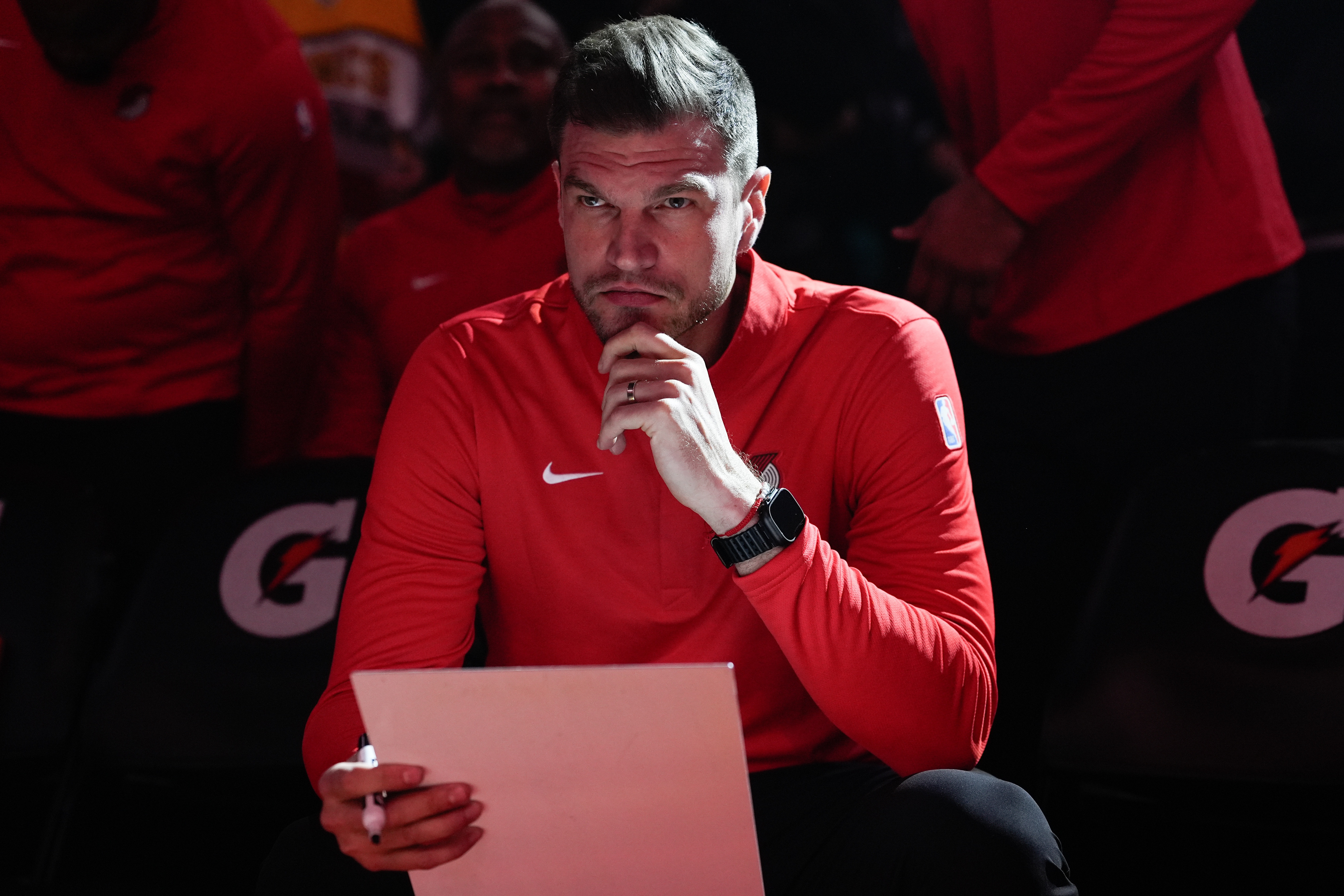 FILE - Portland Trail Blazers interim head coach Tiago Splitter listens during introductions before an NBA basketball game against the Brooklyn Nets, March 23, 2026, in Portland, Ore.