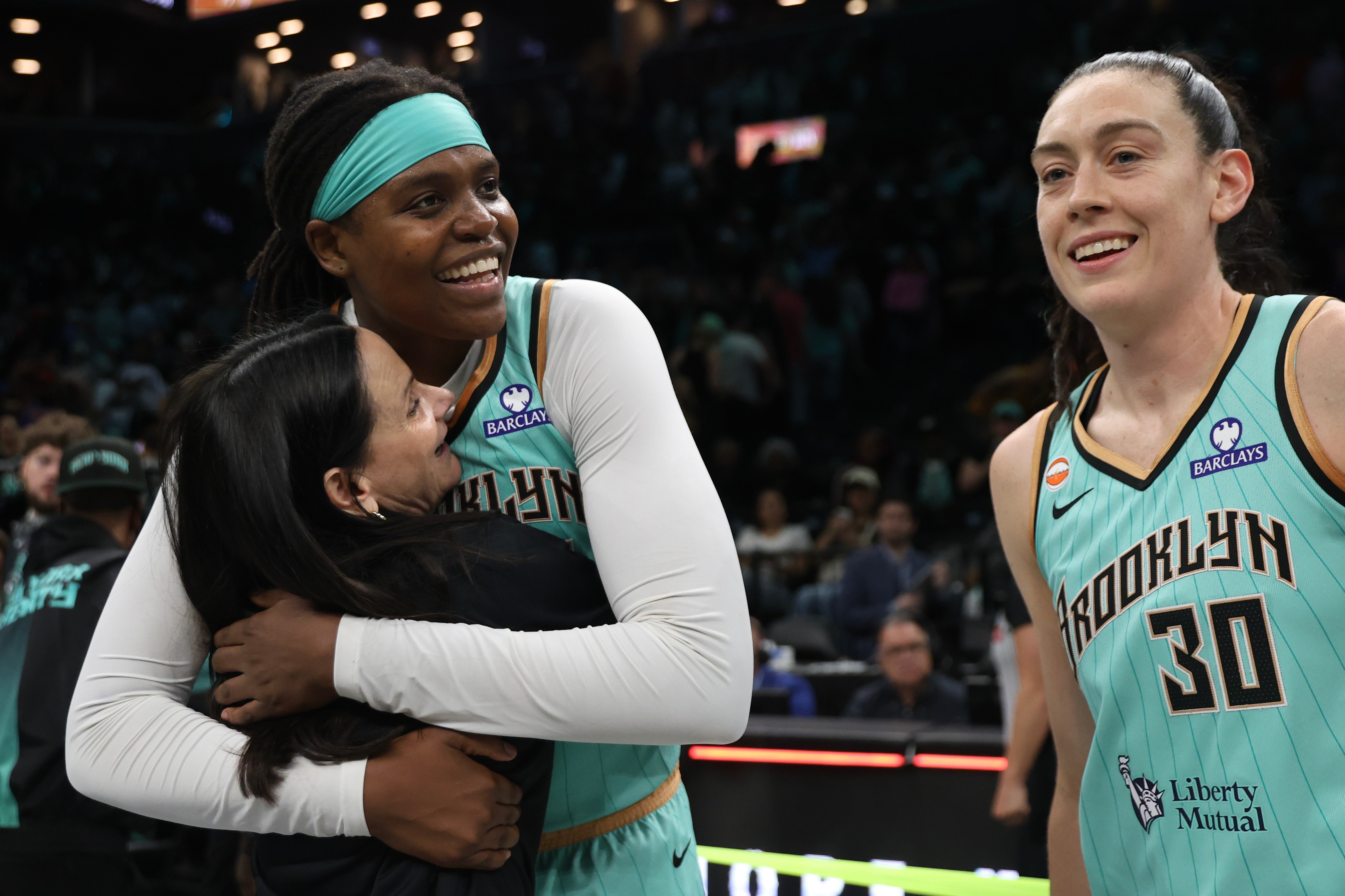 Toronto Tempo head coach Sandy Brondello hugs New York Liberty center Jonquel Jones after a WNBA basketball game, Wednesday, June 3, 2026, in New York.