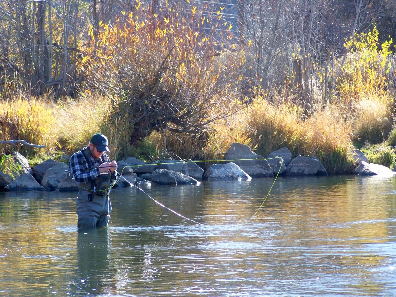 A flyfisherman tries his luck on the Provo River in Heber Valley.