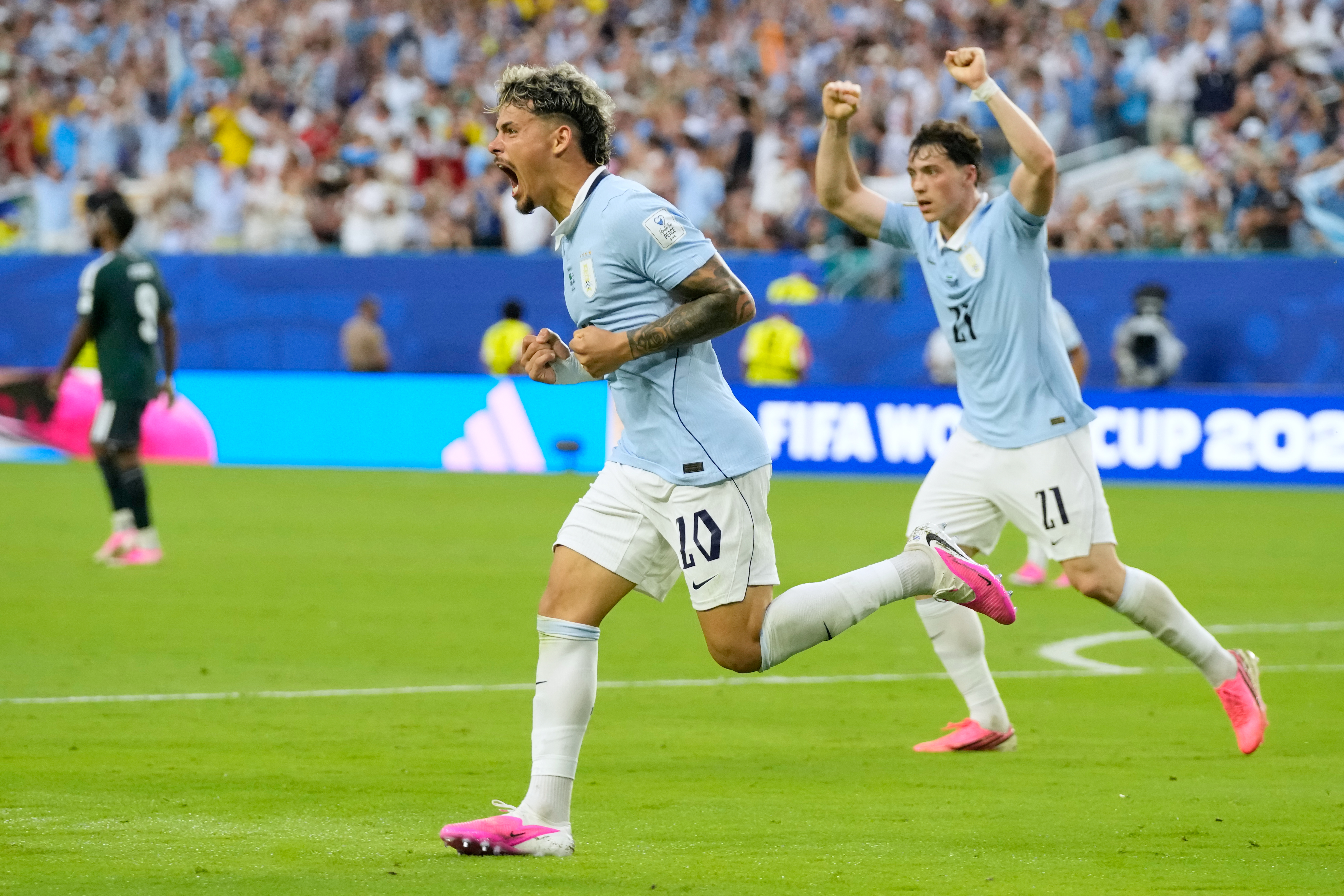Uruguay's Maxi Araujo celebrates scoring his side's opening goal against Saudi Arabia during a World Cup Group H soccer match in Miami Gardens, Fla., Monday, June 15, 2026. 