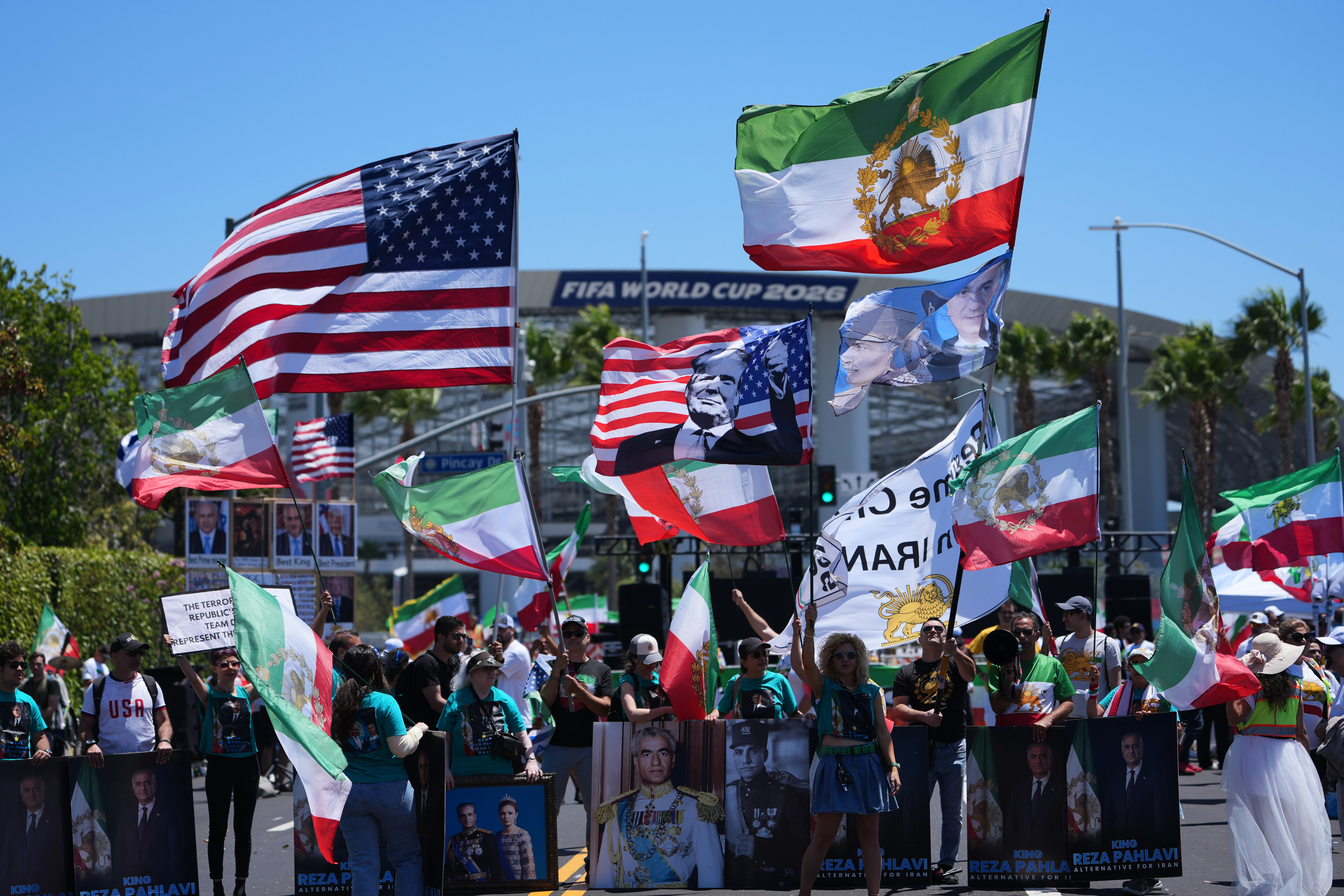 People protest outside Los Angeles Stadium before the World Cup Group G soccer match between Iran and New Zealand in Inglewood, Calif., near Los Angeles, Monday, June 15, 2026.