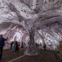 Monumental cave art on Paris' oldest bridge finally opens, as the public steps and sniffs inside