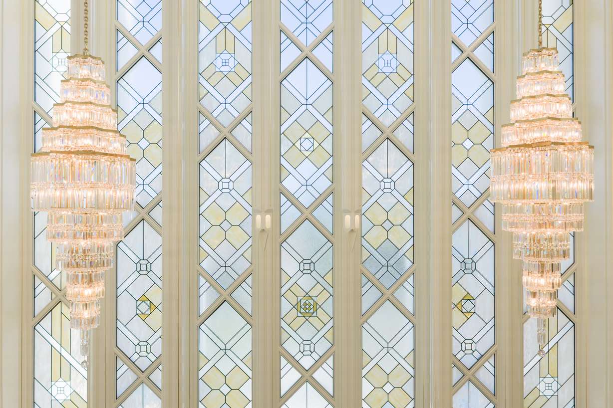 Stained glass windows and chandeliers inside the San Diego California Temple of The Church of Jesus Christ of Latter-day Saints.