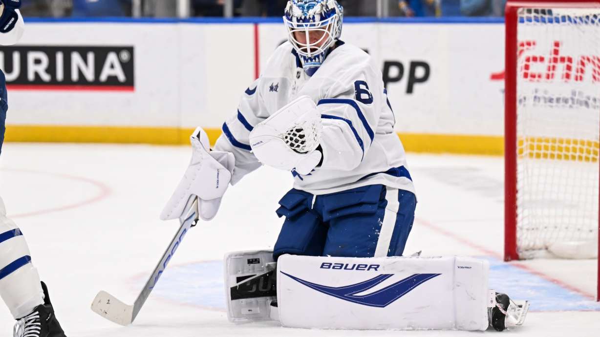 FILE - Toronto Maple Leafs goaltender Joseph Woll (60) makes a glove save against the Toronto Maple Leafs during the second period of an NHL hockey game, March 28, 2026, in St. Louis.