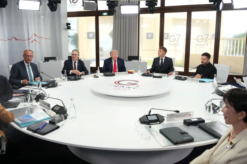 German Chancellor Friedrich Merz, British Prime Minister Keir Starmer, President Donald Trump, French President Emmanuel Macron, Ukrainian President Volodymyr Zelenskyy and Japan’s Prime Minister Sanae Takaichi during a working session at the G7 summit in Evian-les-Bains, France, Tuesday.