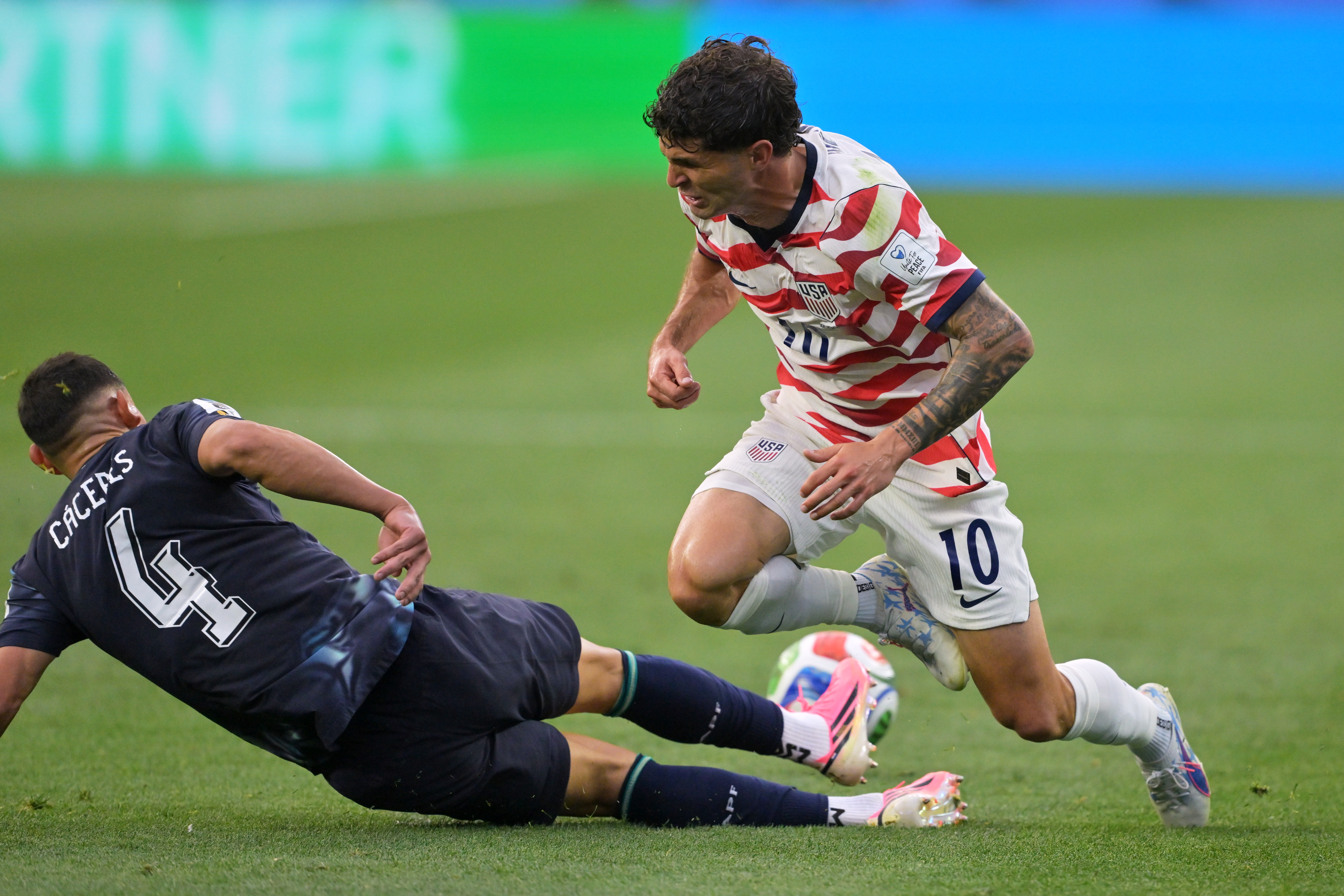 US forward Christian Pulisic practices on his own in calf injury rehab, team says he is 'day to day'
