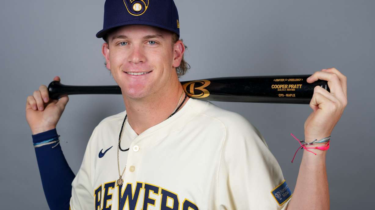 FILE - Milwaukee Brewers infielder Cooper Pratt poses for an official photo, Feb. 21, 2025.
