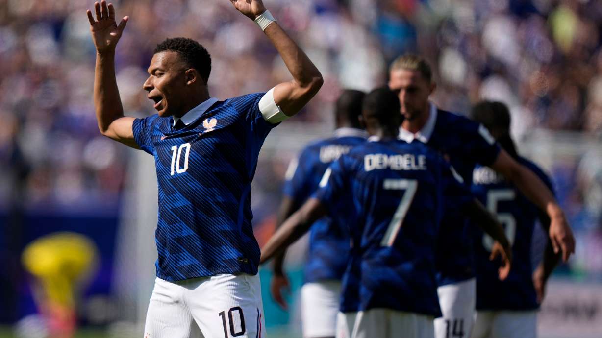 France's Kylian Mbappe celebrates after scoring the opening goal of his team during the World Cup Group I soccer match between France and Senegal in East Rutherford, N.J., near New York, Tuesday, June 16, 2026.