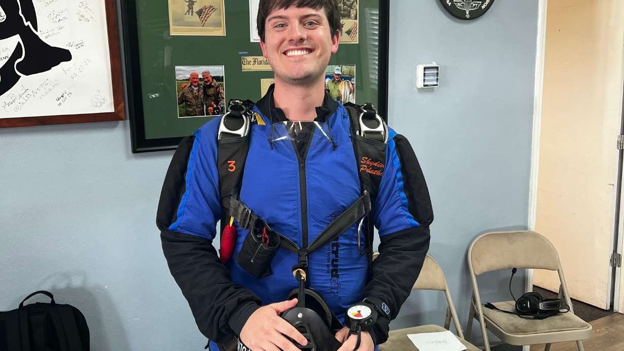 This Aug. 2024 photo provided by Richard Thacker shows Blake Thacker during a skydiving outing in Florida.