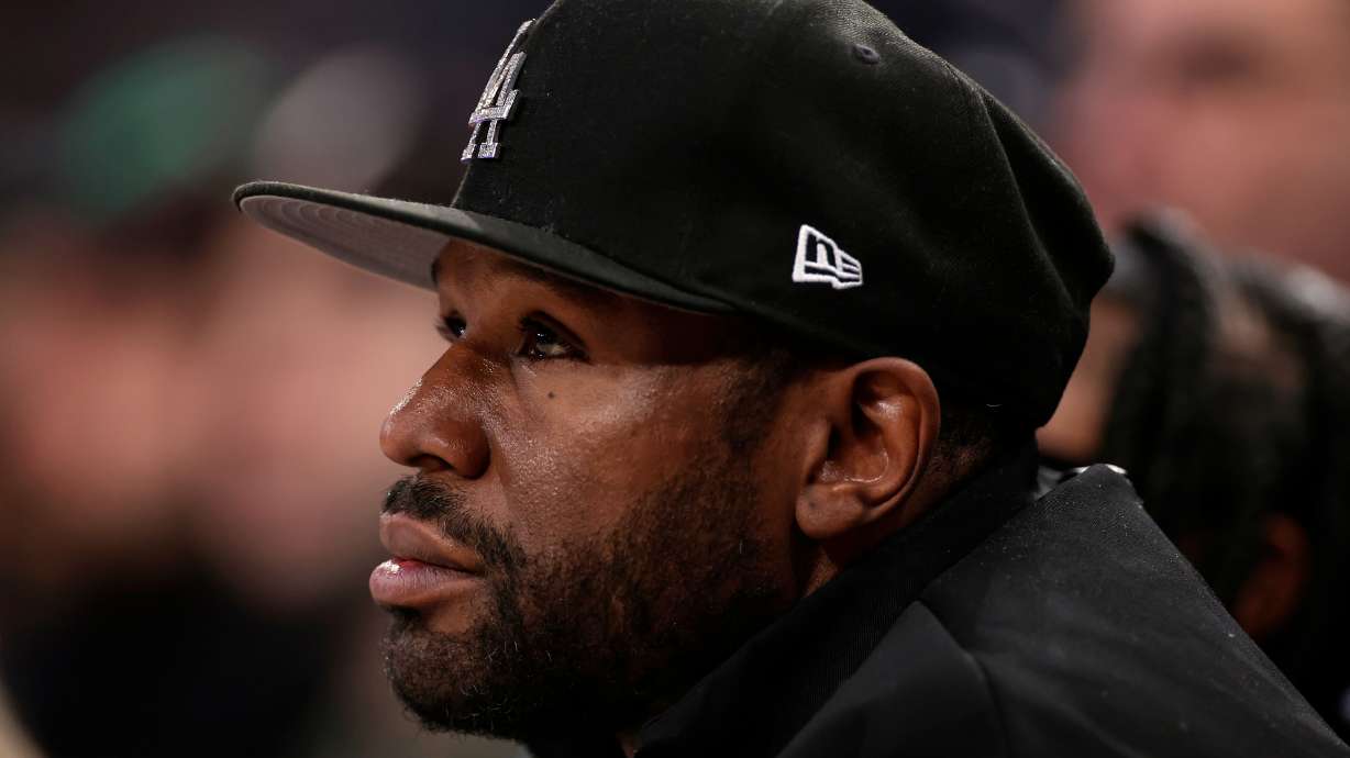 FILE - Boxer Floyd Mayweather Jr. looks on during the first half of an NBA basketball game, March 26, 2025, in New York.