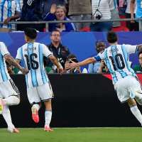 Lionel Messi ties men's World Cup goals record with a hat trick as Argentina tops Algeria