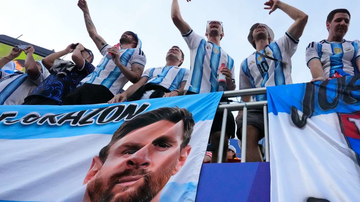 Argentinian fans react ahead of the World Cup Group J soccer match between Argentina and Algeria in Kansas City, Mo., Tuesday, June 16, 2026.