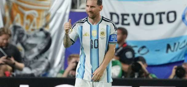 Messi has his first World Cup hat trick as defending champion Argentina beats Algeria 3-0 in opener
