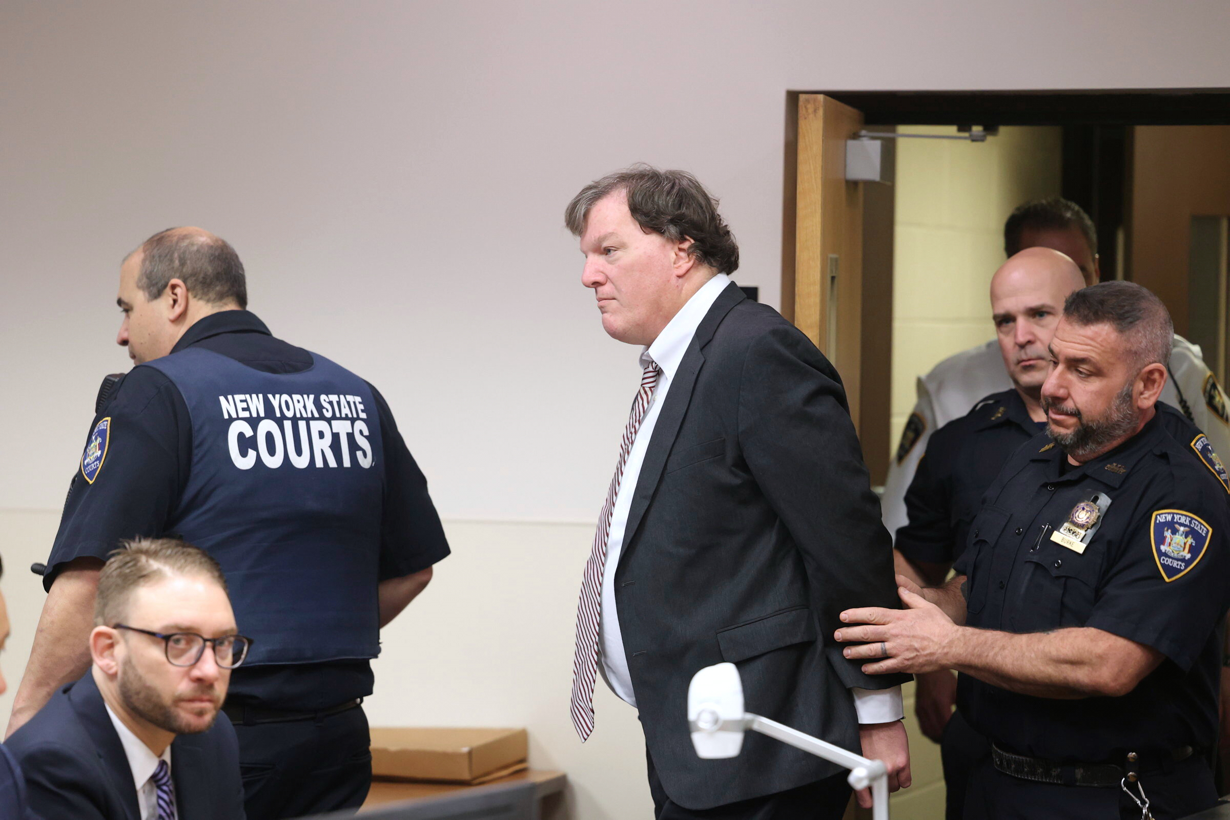 Alleged Gilgo serial killer Rex Heuermann is led into courtroom for a Frye hearing at Suffolk County Court in Riverhead, N.Y., April 3, 2025. Heuermann was sentenced to life in prison without parole.