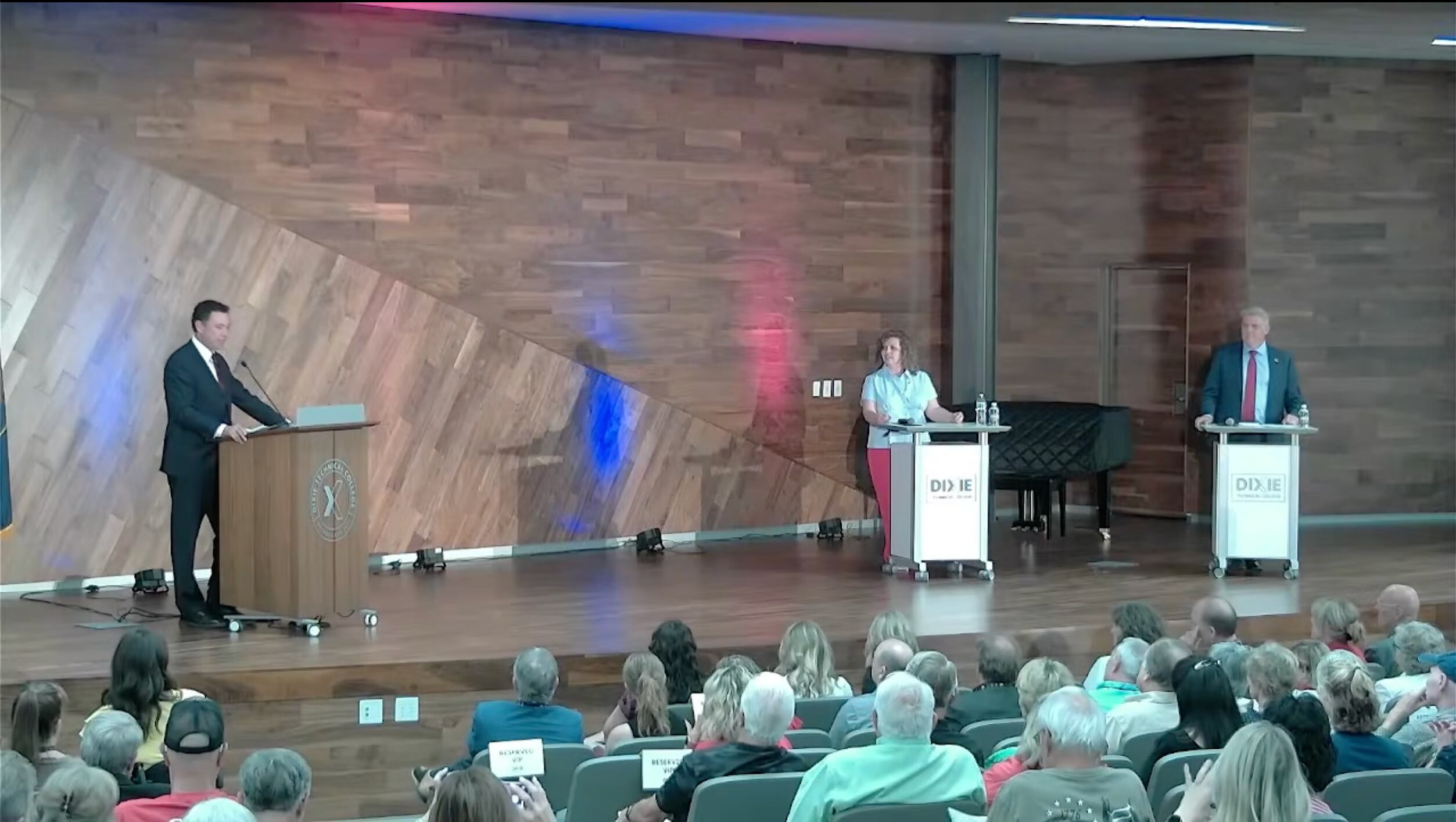 Former U.S. Rep. Jason Chaffetz moderates a debate for Utah's 3rd Congressional District between candidates Rep. Celeste Maloy and former state Rep. Phil Lyman at Dixie Technical College in St. George on Tuesday. Artificial intelligence was the hot topic of the debate.