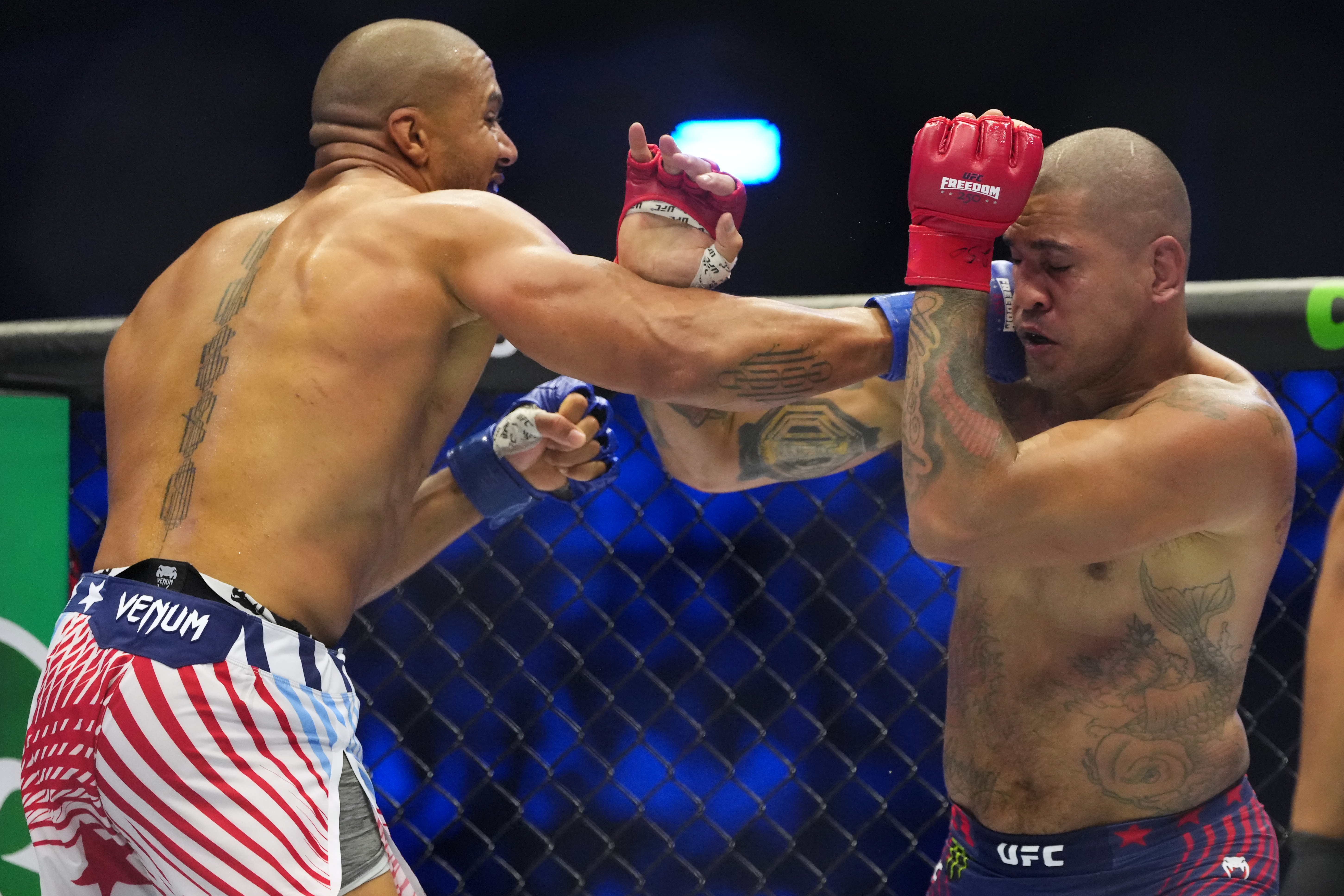 Alex Pereira, right, fights Ciryl Gane during their interim heavyweight title bout at UFC Freedom 250 on the South Lawn of the White House, Monday, June 15, 2026, in Washington.