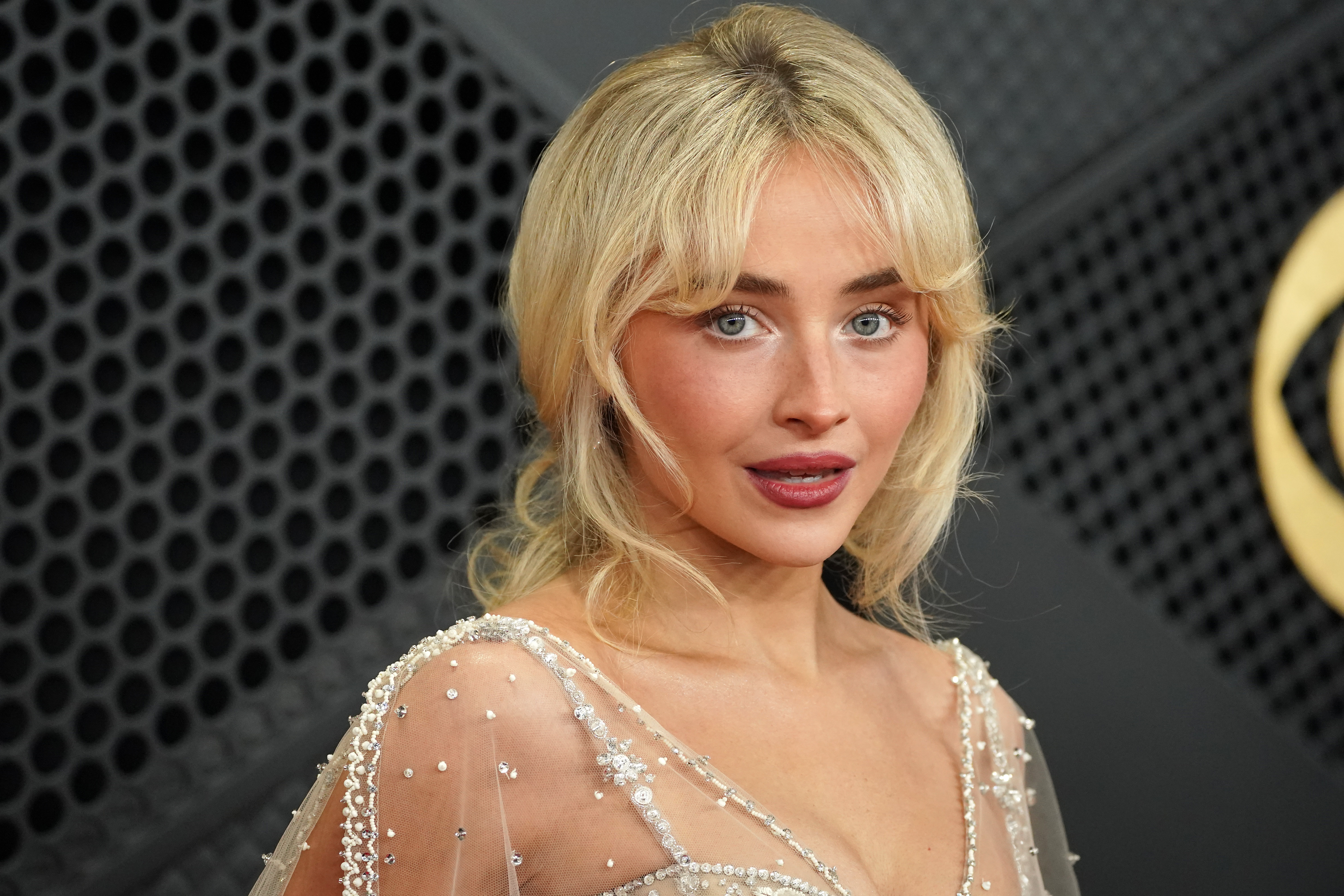 Sabrina Carpenter appears at the 68th annual Grammy Awards in Los Angeles on Feb. 1. A man who tried to get into Carpenter's home more than a dozen times was ordered by a judge Wednesday to stay away from her for five years.