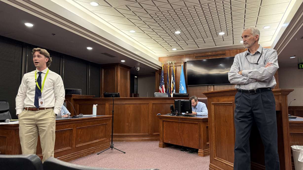 Kai Schwemmer, who was appointed as chief deputy clerk for Utah County before his title and role was adjusted to confidential administrative associate, speaks at a town hall with Utah County Clerk Aaron Davidson in Provo on June 11.