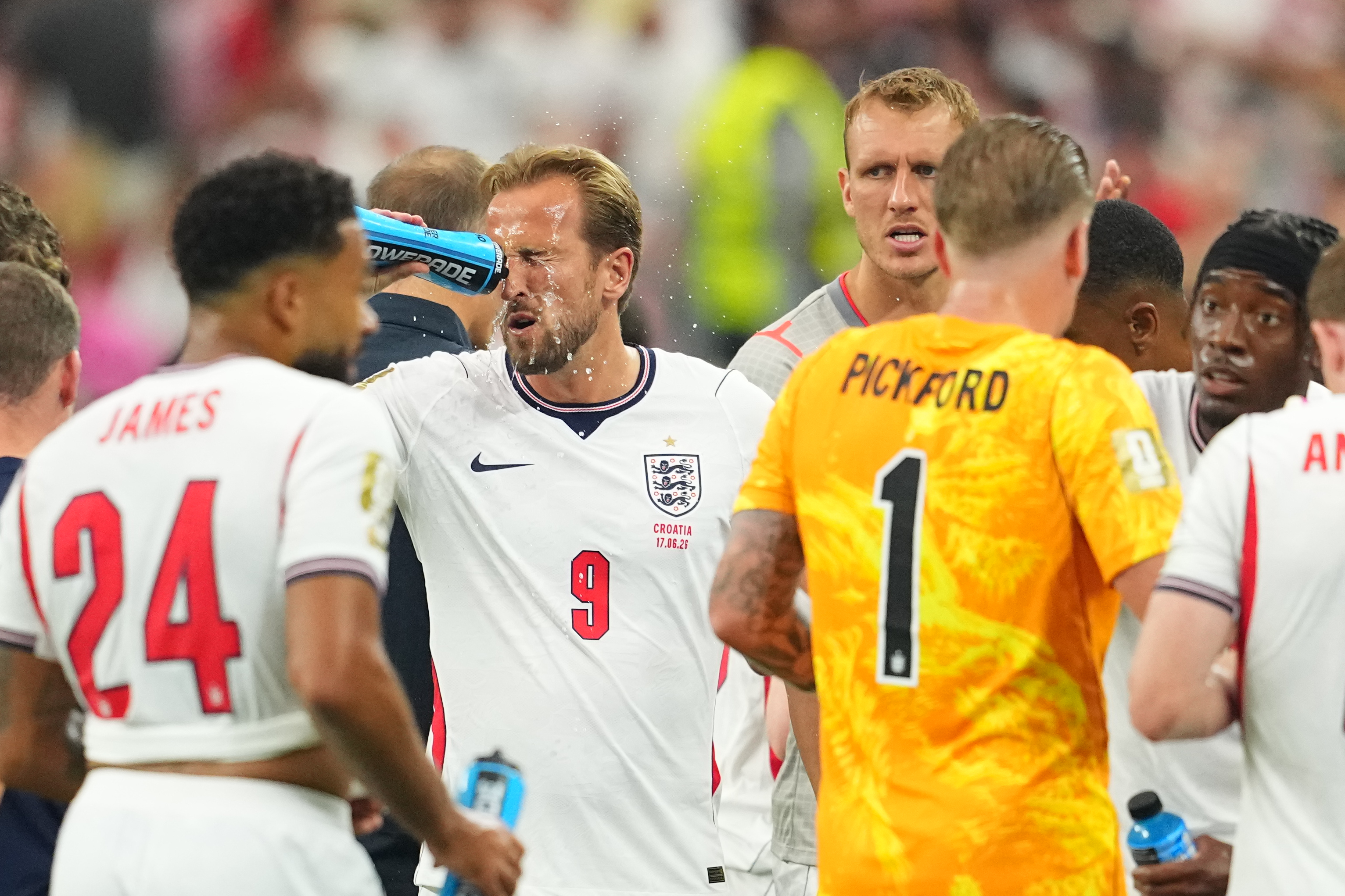 England's Harry Kane (9) cools off during a hydration break of the World Cup Group L soccer match between England and Croatia in Arlington, Texas, near Dallas, Wednesday, June 17, 2026. 