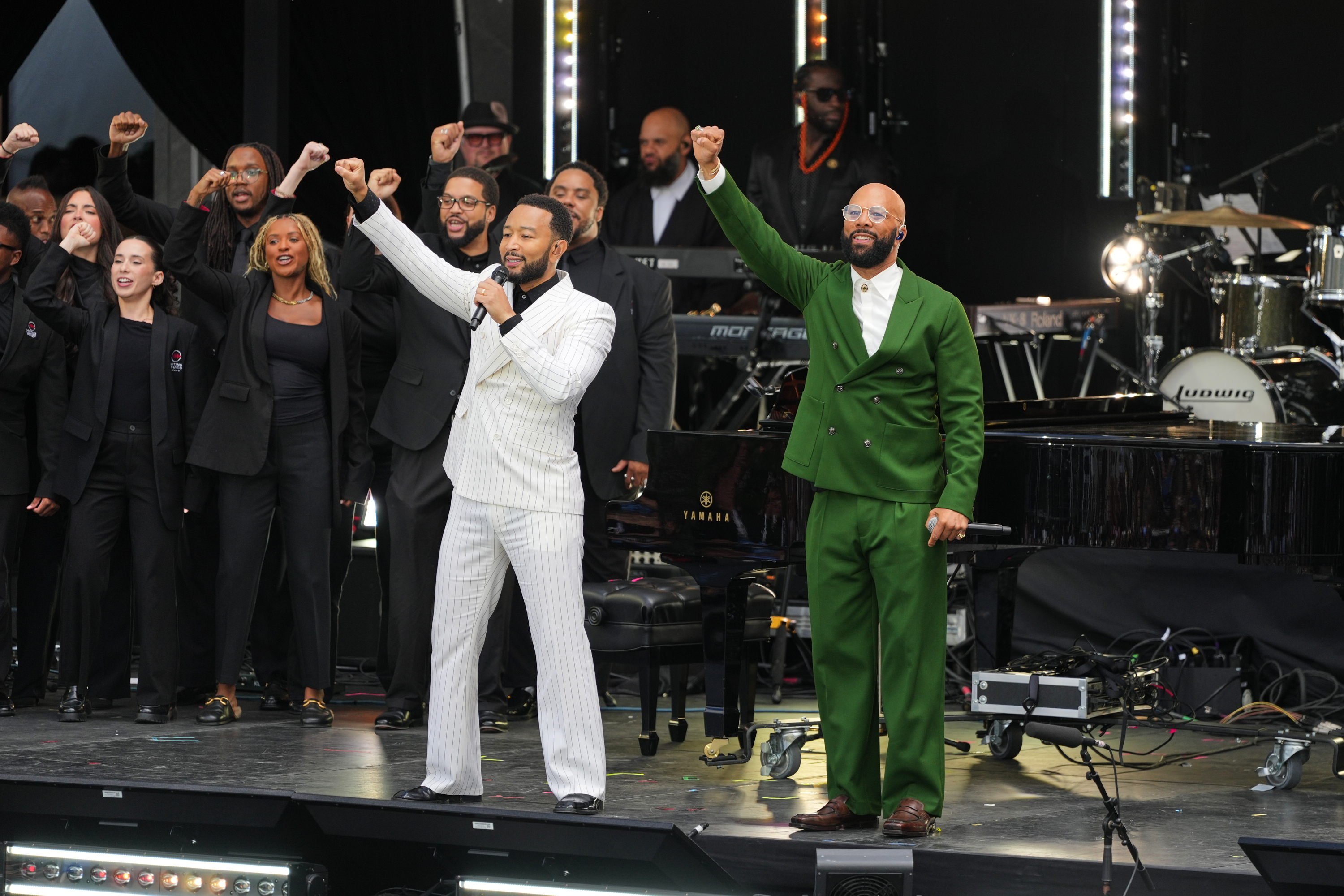 Singer John Legend and rapper Common perform during the dedication ceremony for the Obama Presidential Center, Thursday, in Chicago. Legend and Common were among the A-list performers at the ceremony.