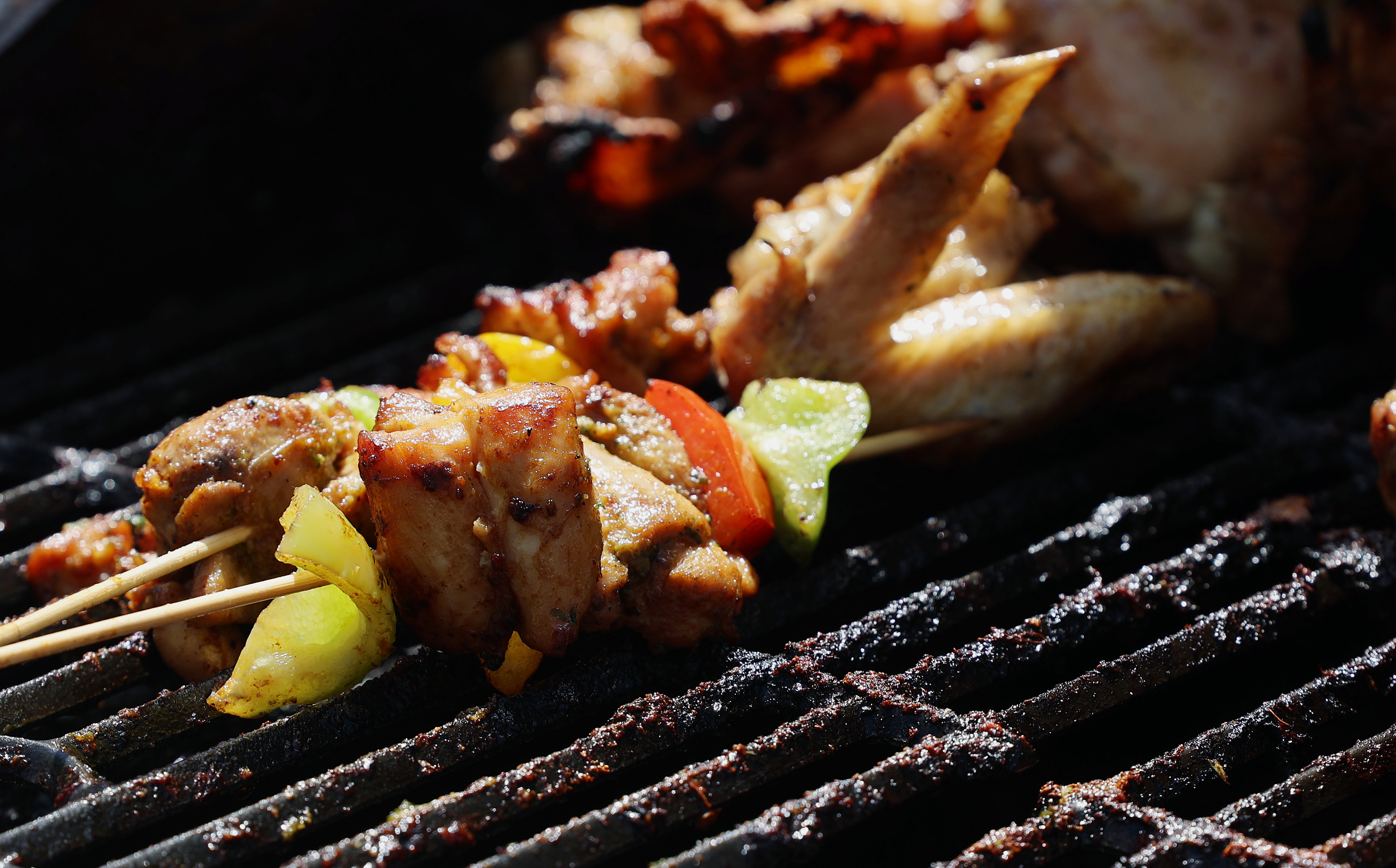 Food cooks on a grill at the Juneteenth festival in Ogden on June 17, 2023. Food plays a central role in the holiday, as it does for many holidays.