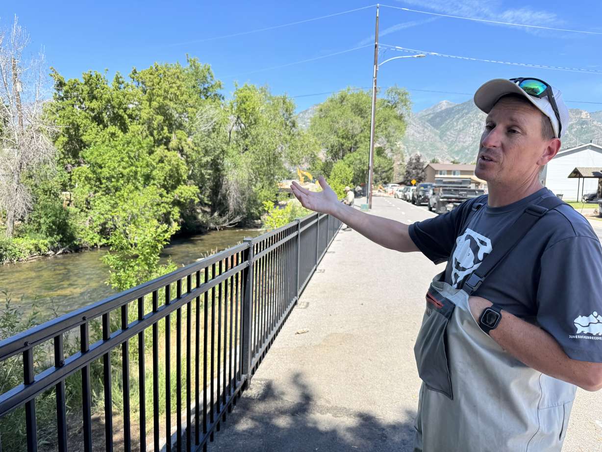 Russ Franklin is pictured gesturing toward the Provo River on Thursday.