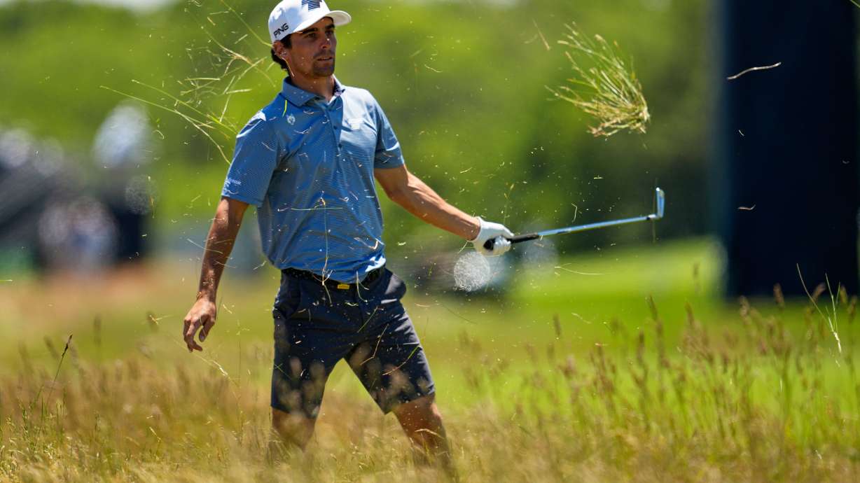 Joaquin Niemann hits from the rough on the third hole during a practice round for the U.S. Open golf tournament at Shinnecock Hills Golf Club in Southampton, N.Y., Tuesday, June 16, 2026.