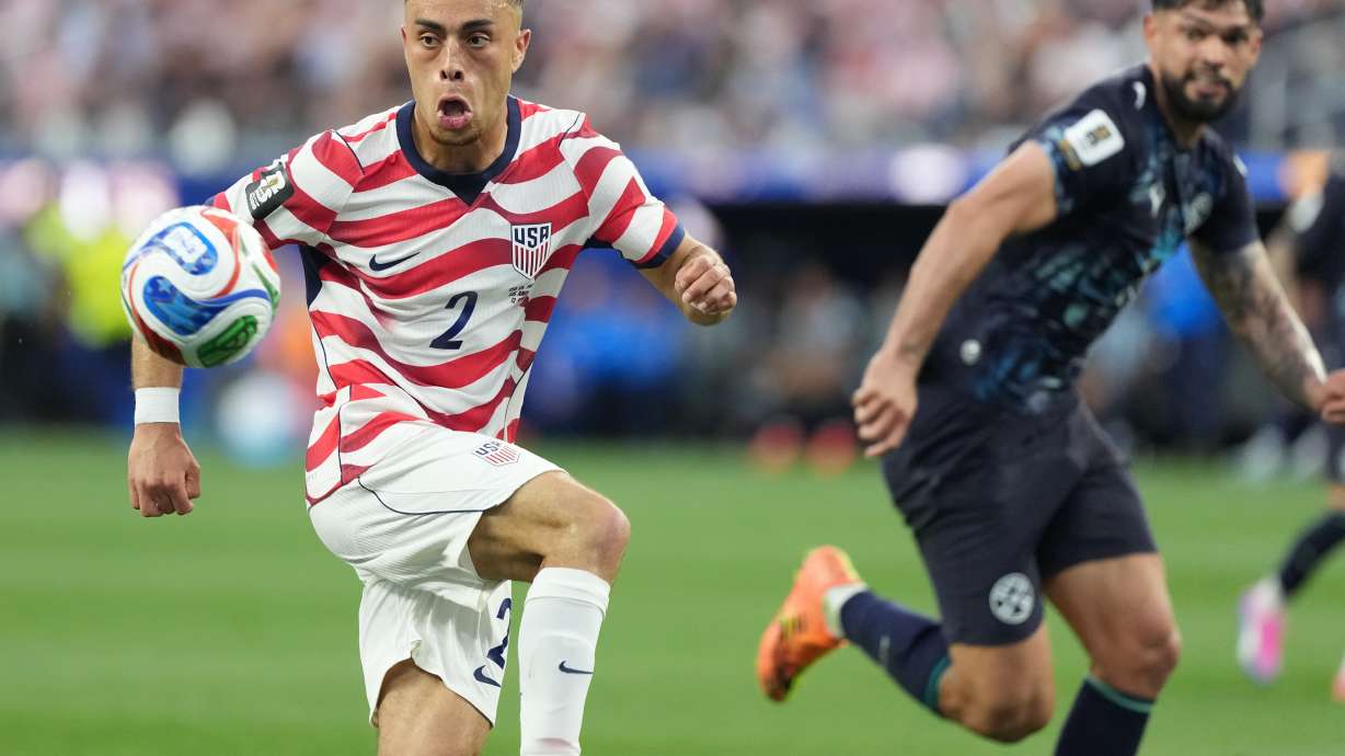 United States' Sergino Dest, left, controls a ball next to Paraguay's Omar Alderete during the World Cup Group D soccer match in Inglewood, Calif., near Los Angeles, Friday, June 12, 2026.