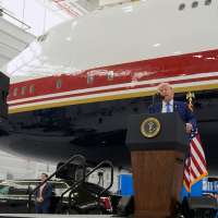 President Donald Trump unveils the new Air Force One, a converted Qatari jet