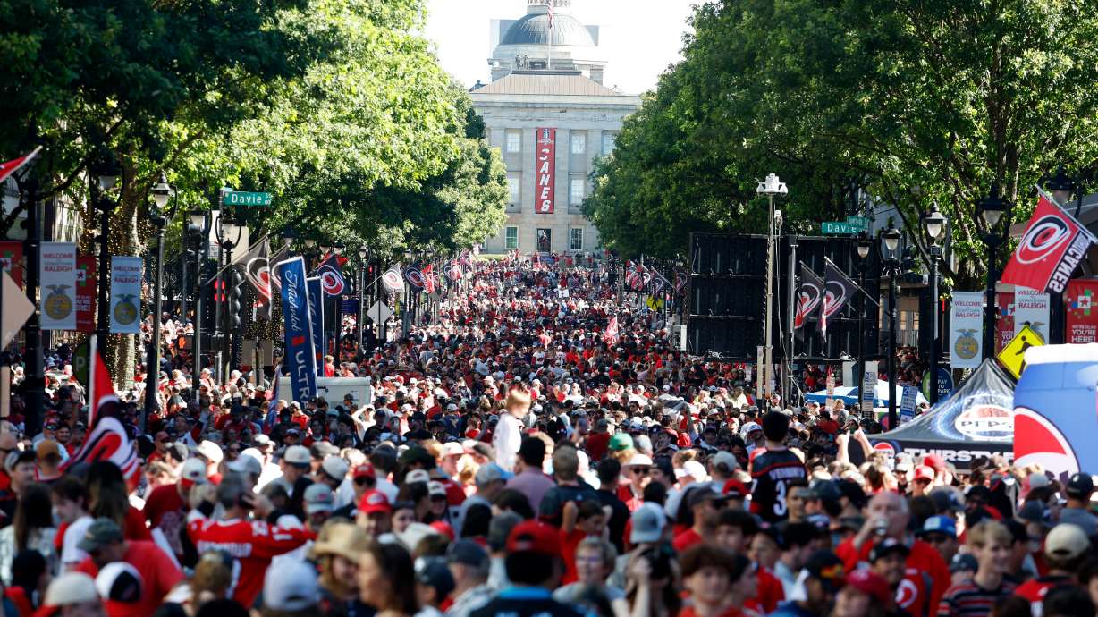 Carolina Hurricanes fans crowd onto Fayetteville Street prior to the start of the Stanley Cup Championship celebration in Raleigh, N.C., Saturday, June 20, 2026.