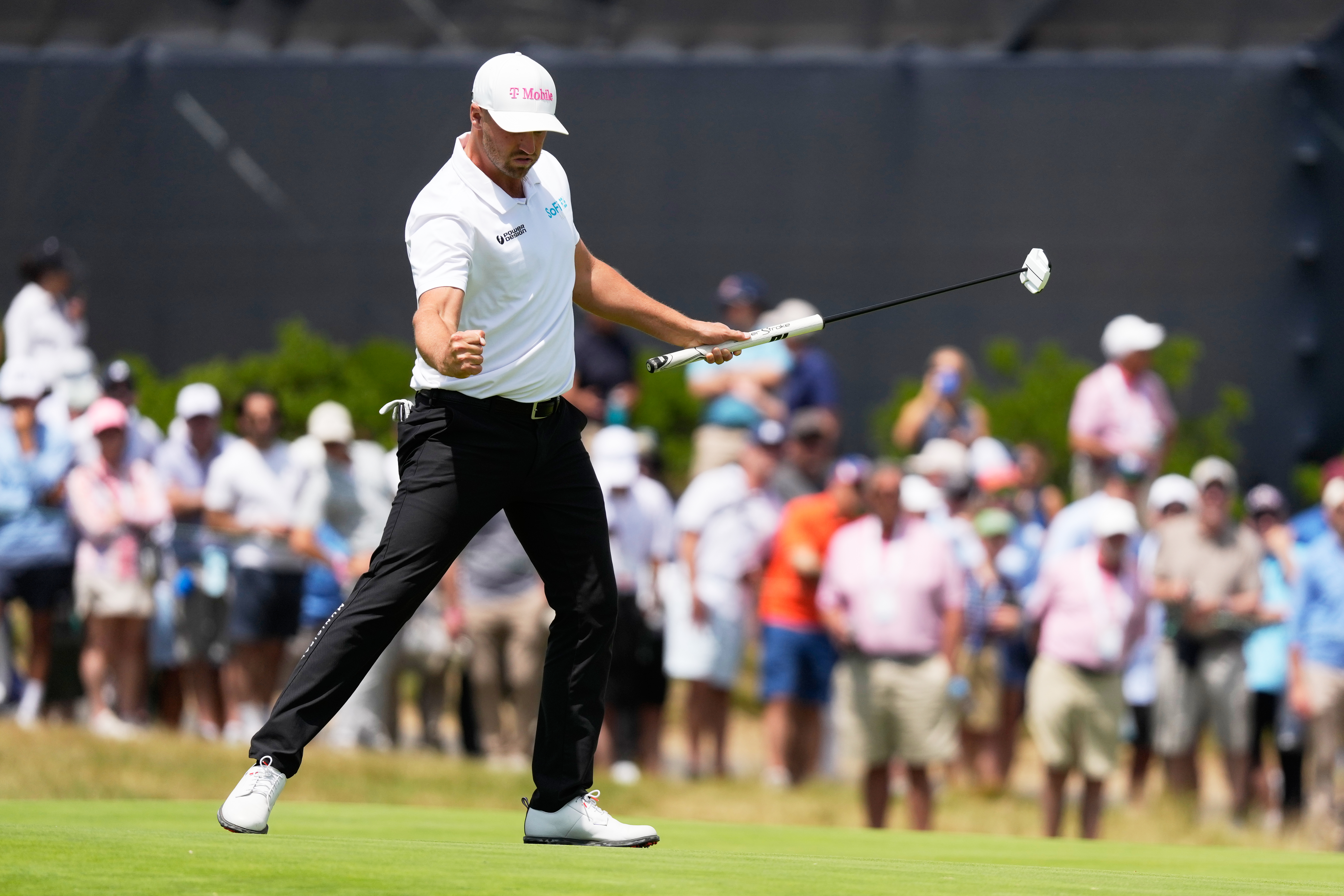 Wyndham Clark celebrates after a birdie on the 13th hole during the second round of the U.S. Open golf tournament at Shinnecock Hills Golf Club in Southampton, N.Y., Friday, June 19, 2026.