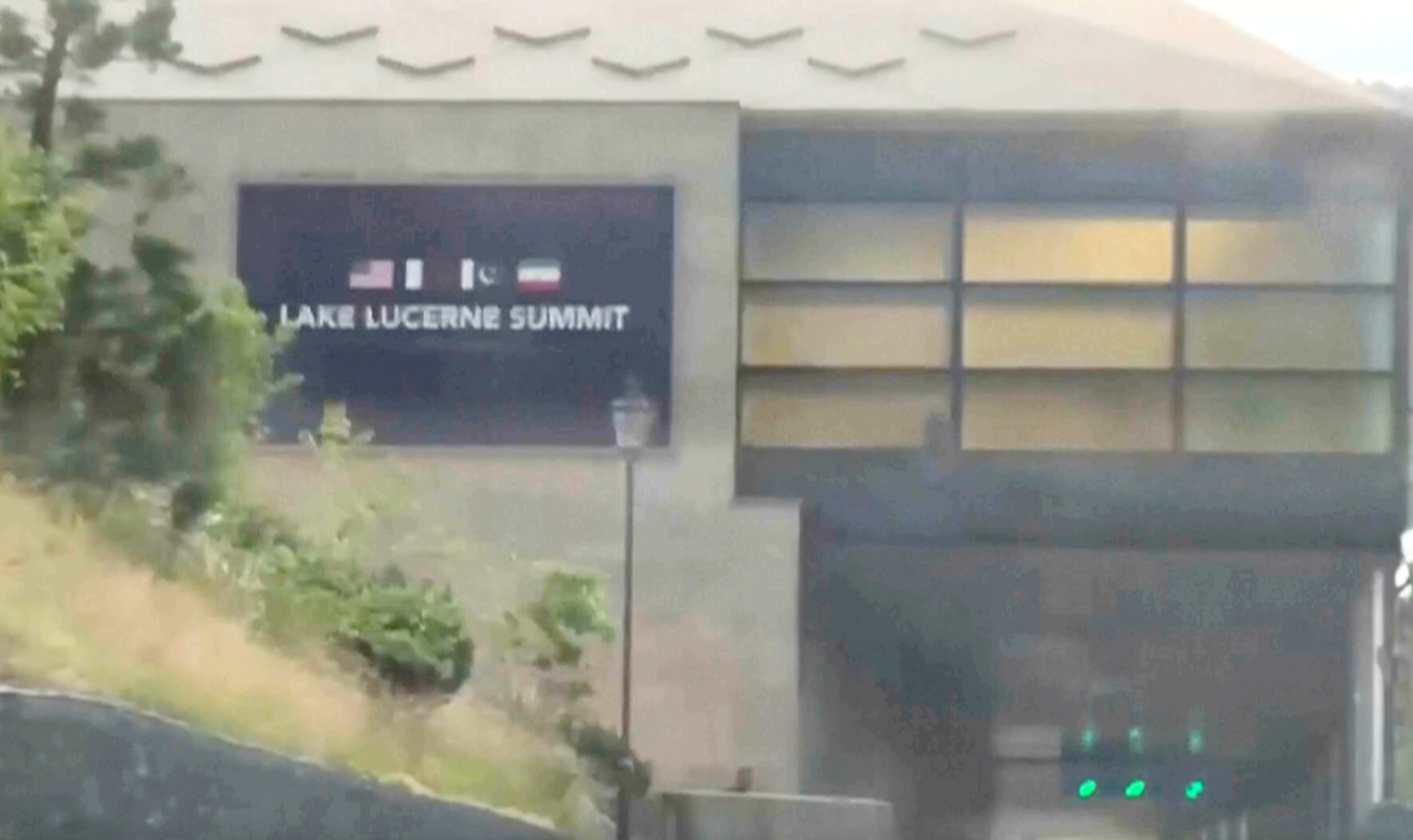 Signs indicating planned U.S.-Iran peace talks are displayed at the Bürgenstock Resort in Obbuergen, near Lucerne, in Switzerland, Friday. U.S. and Iran negotiators are en route to discuss details of the interim agreement to end the war, sources said Saturday.