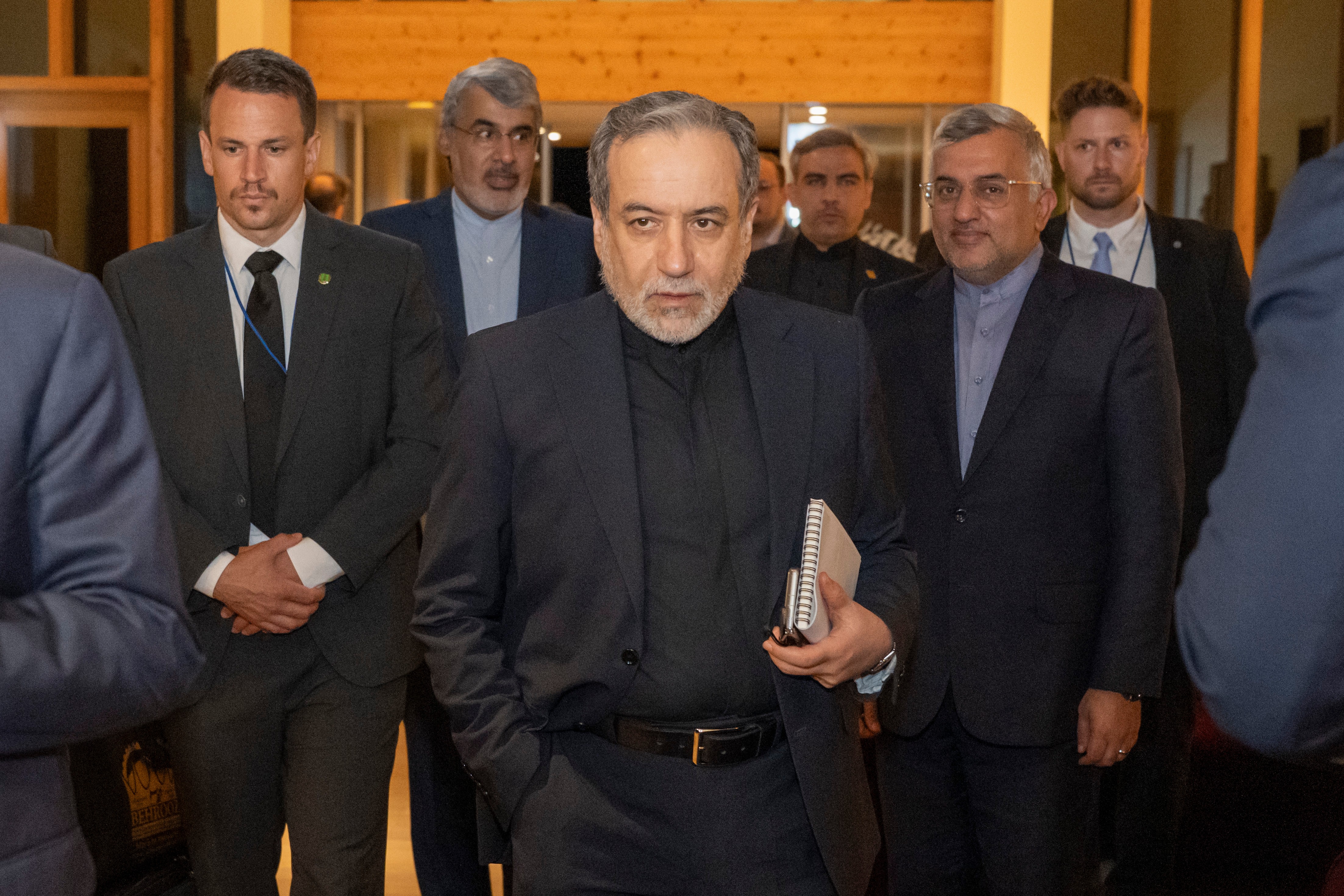 Iranian Foreign Minister Seyyed Abbas Araghchi, center, arrives at the Buergenstock resort in Obbuergen, near Lucerne, Switzerland, early Sunday, where the U.S. and Iran are expected to discuss an interim agreement to end the war.
