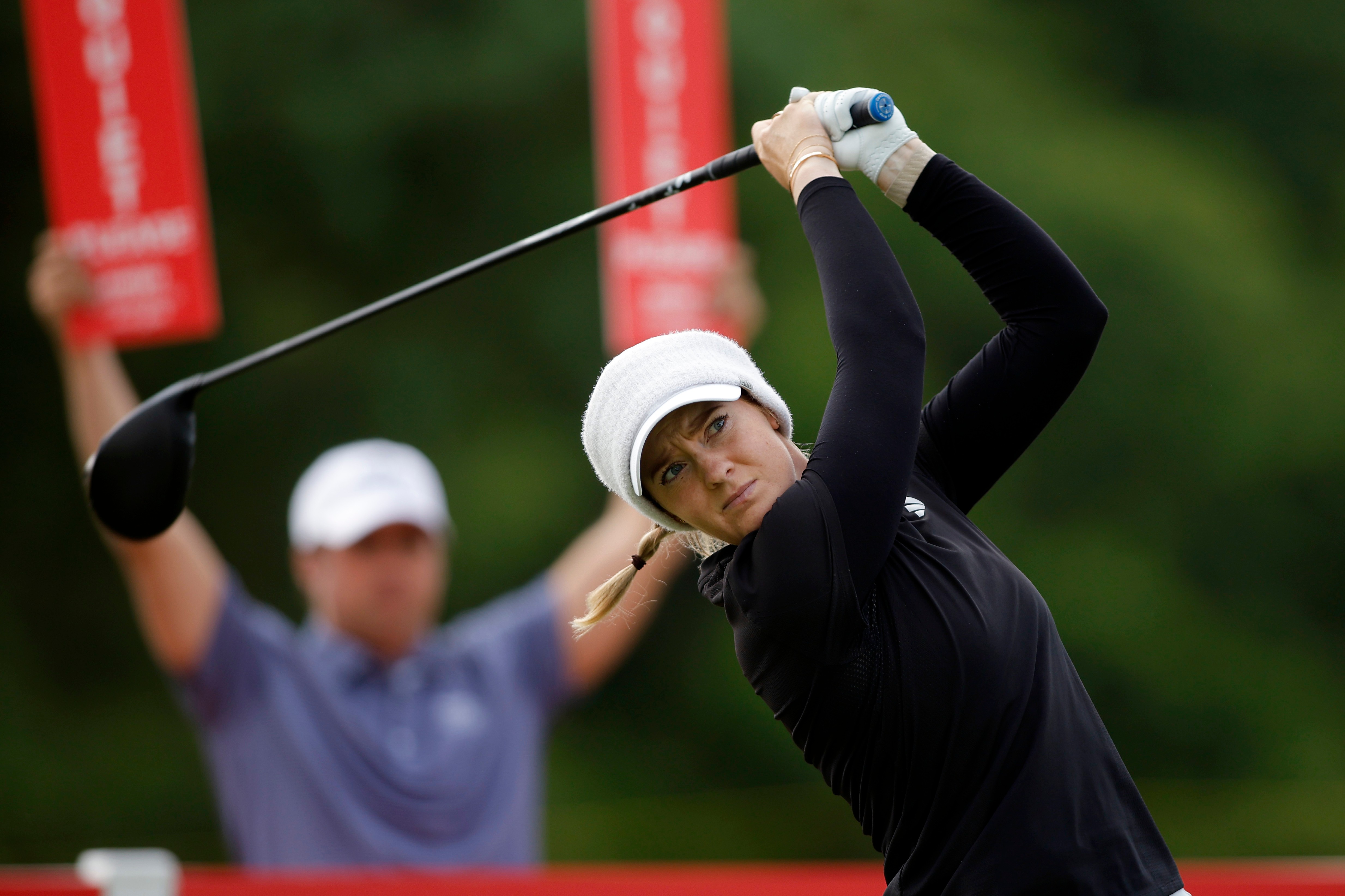 Jing Yan maintains lead in the wind-swept Meijer LPGA Classic