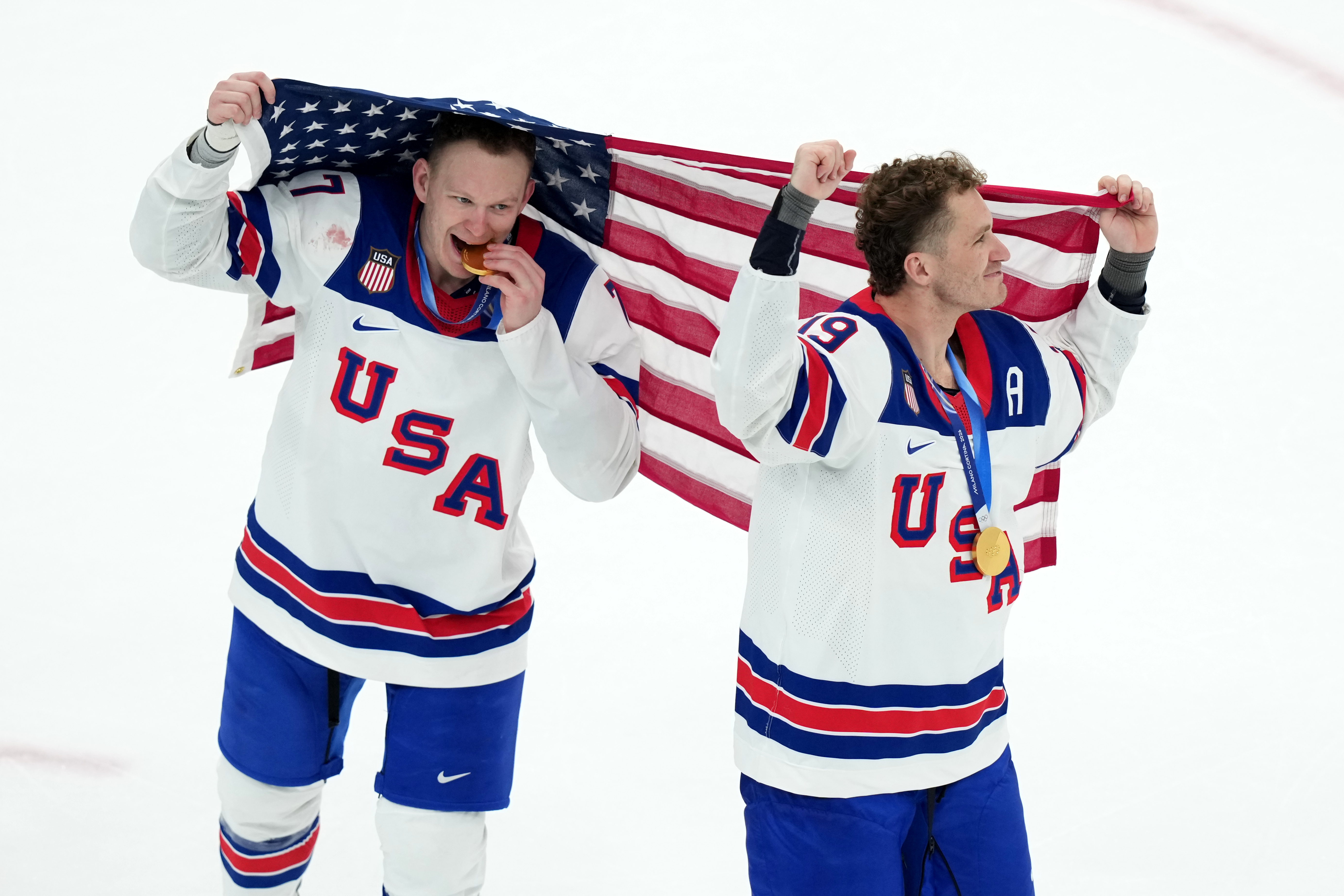 FILE - United States' Brady Tkachuk (7) and Matthew Tkachuk (19) celebrate after the United States' win over Canada in the men's ice hockey gold medal game at the 2026 Winter Olympics in Milan, Italy, Feb. 22, 2026.