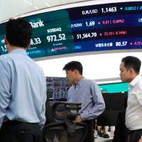 US stocks drift near their records in mixed trading after oil prices fall