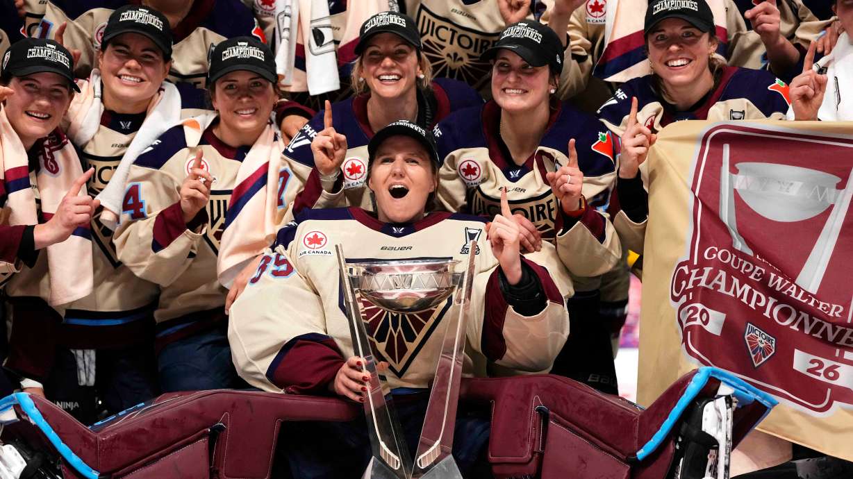 FILE - The Montreal Victoire pose for a photo with the PWHL Walter Cup after the team's win against the Ottawa Charge, in Ottawa, May 20, 2026.