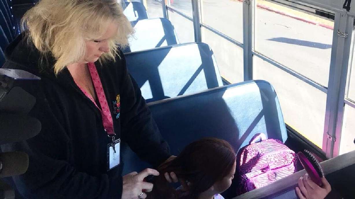 Bus driver turns into hair dresser for girls on bus