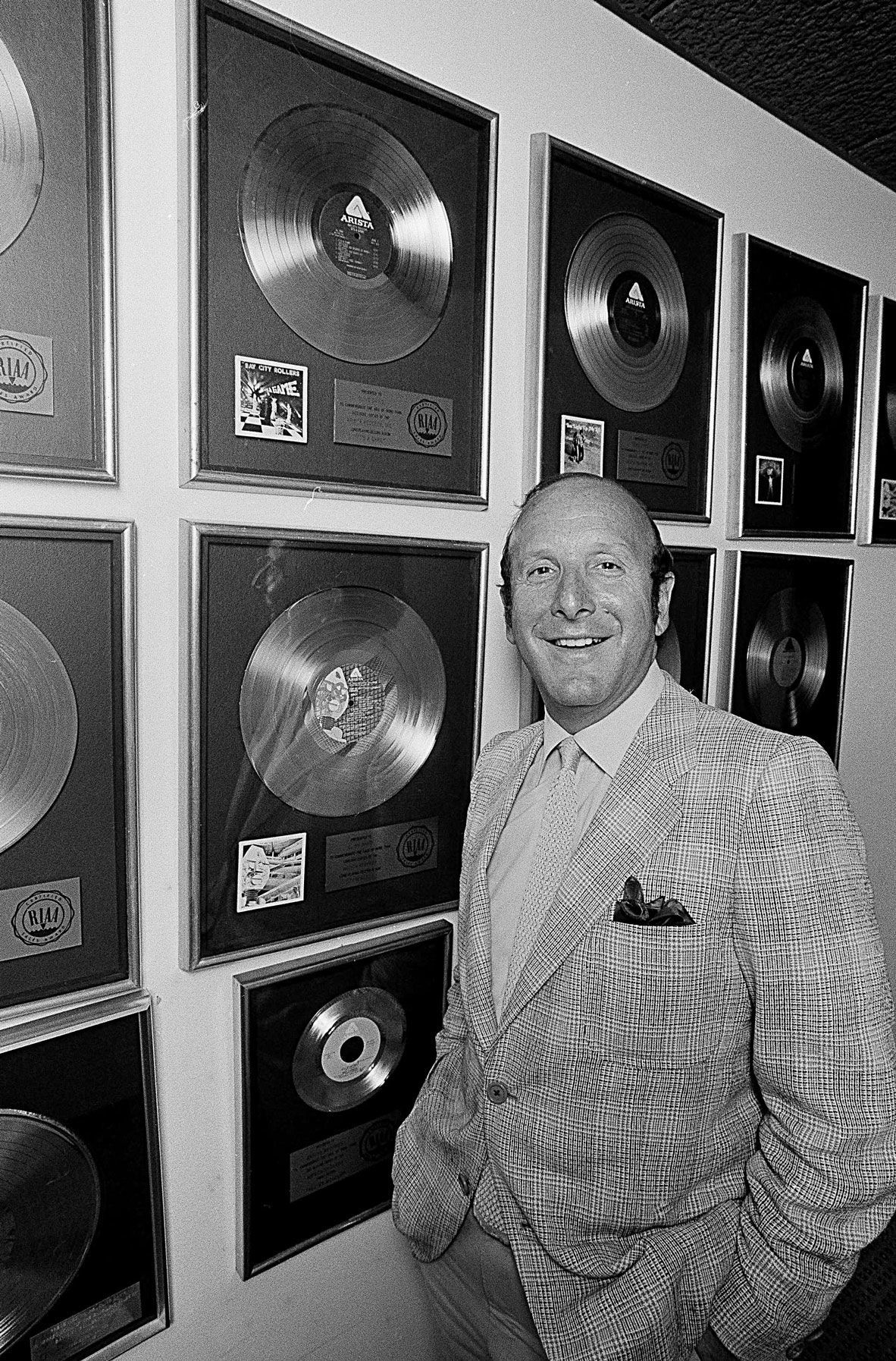 Record mogul Clive Davis is pictured in his New York office in September 1980. Davis, the legendary music producer of industry icons from Janis Joplin and Whitney Houston to Billy Joel and Santana, has died.