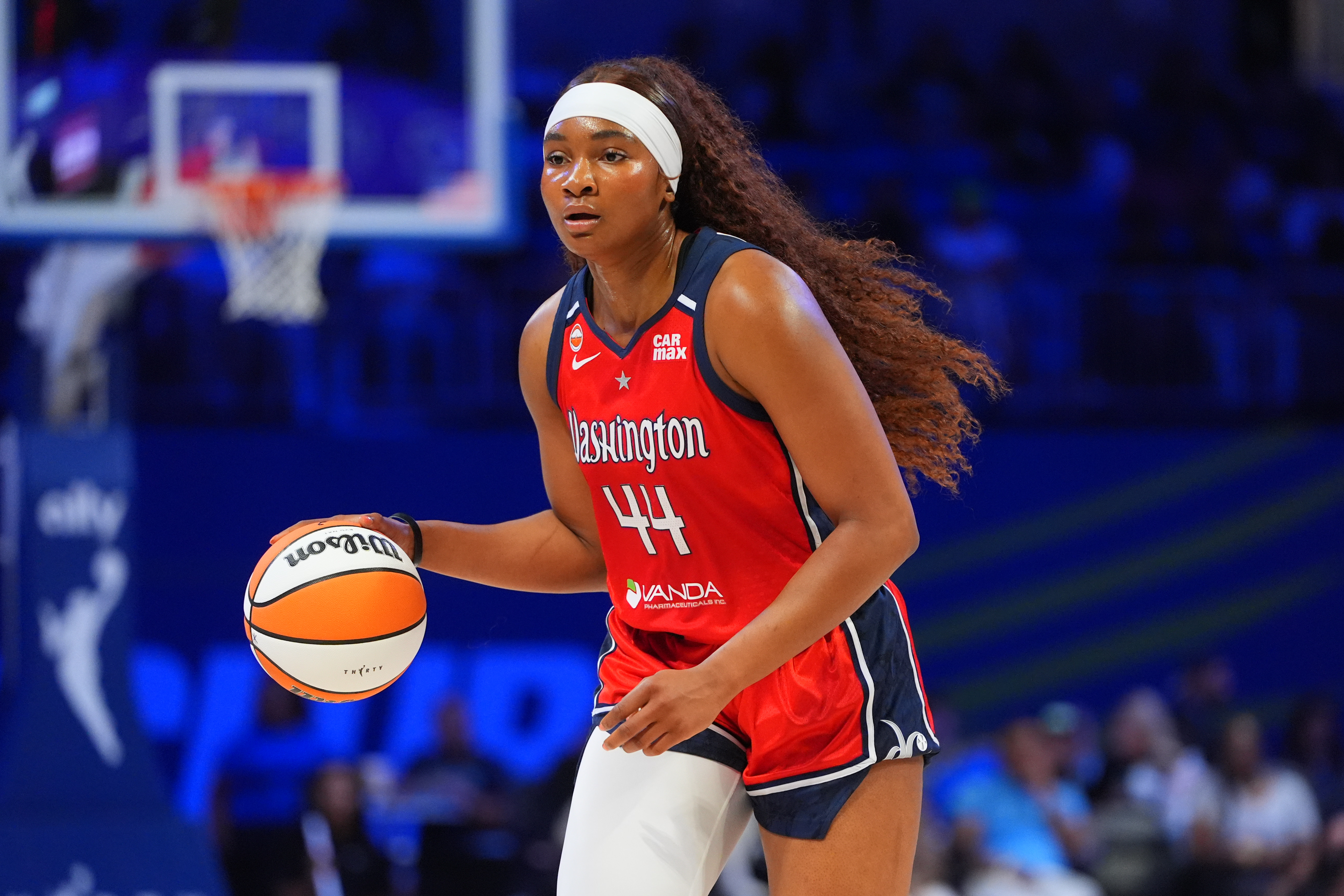 FILE - Washington Mystics forward Kiki Iriafen dribbles during the first half of a WNBA basketball game against the Dallas Wings in Arlington, Texas, May 18, 2026.
