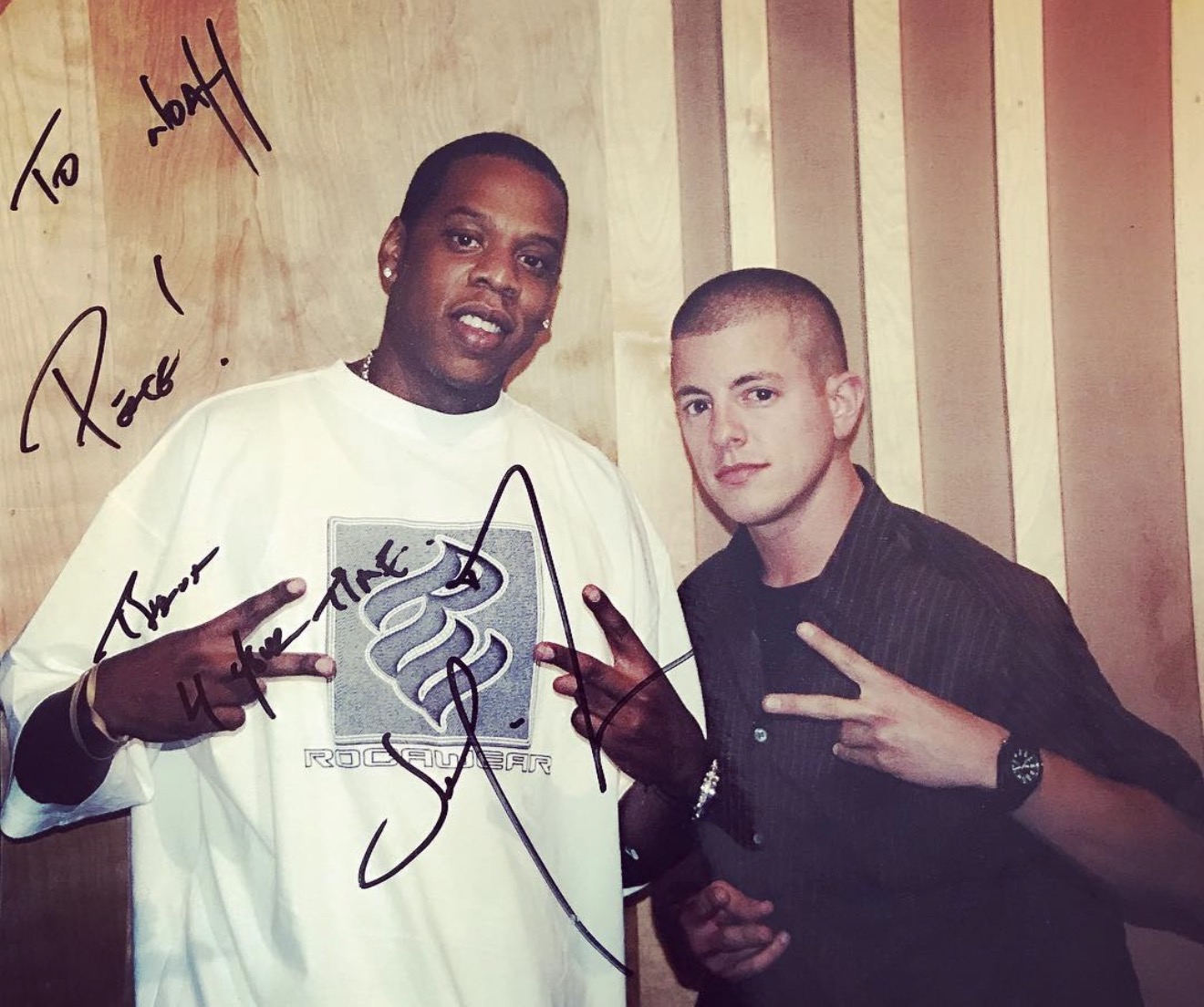 Noah Sheer and Jay-Z pose together during the early years of their careers in the music industry.