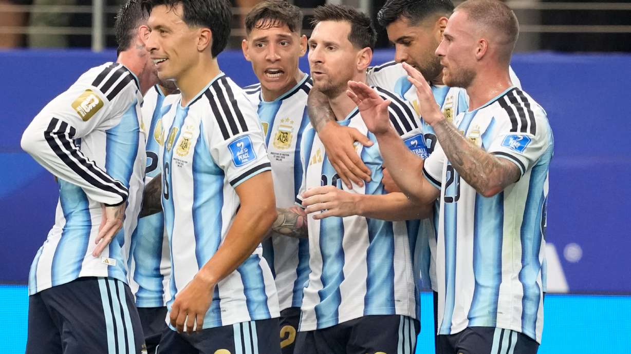 Argentina's Lionel Messi (10) celebrates scoring his side's first goal against Austria with teammates during the World Cup Group J soccer match in Arlington, Texas, near Dallas, Monday, June 22, 2026.