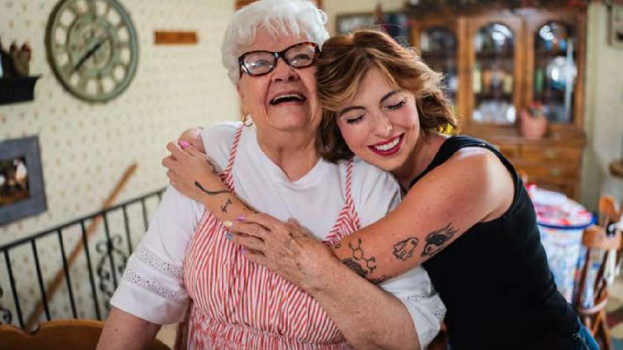 Shelby Coleman, right, and her grandmother VaLynne Thompson, left, pose at Thompson’s home in Mapleton on June 4. The pair run a TikTok account together.