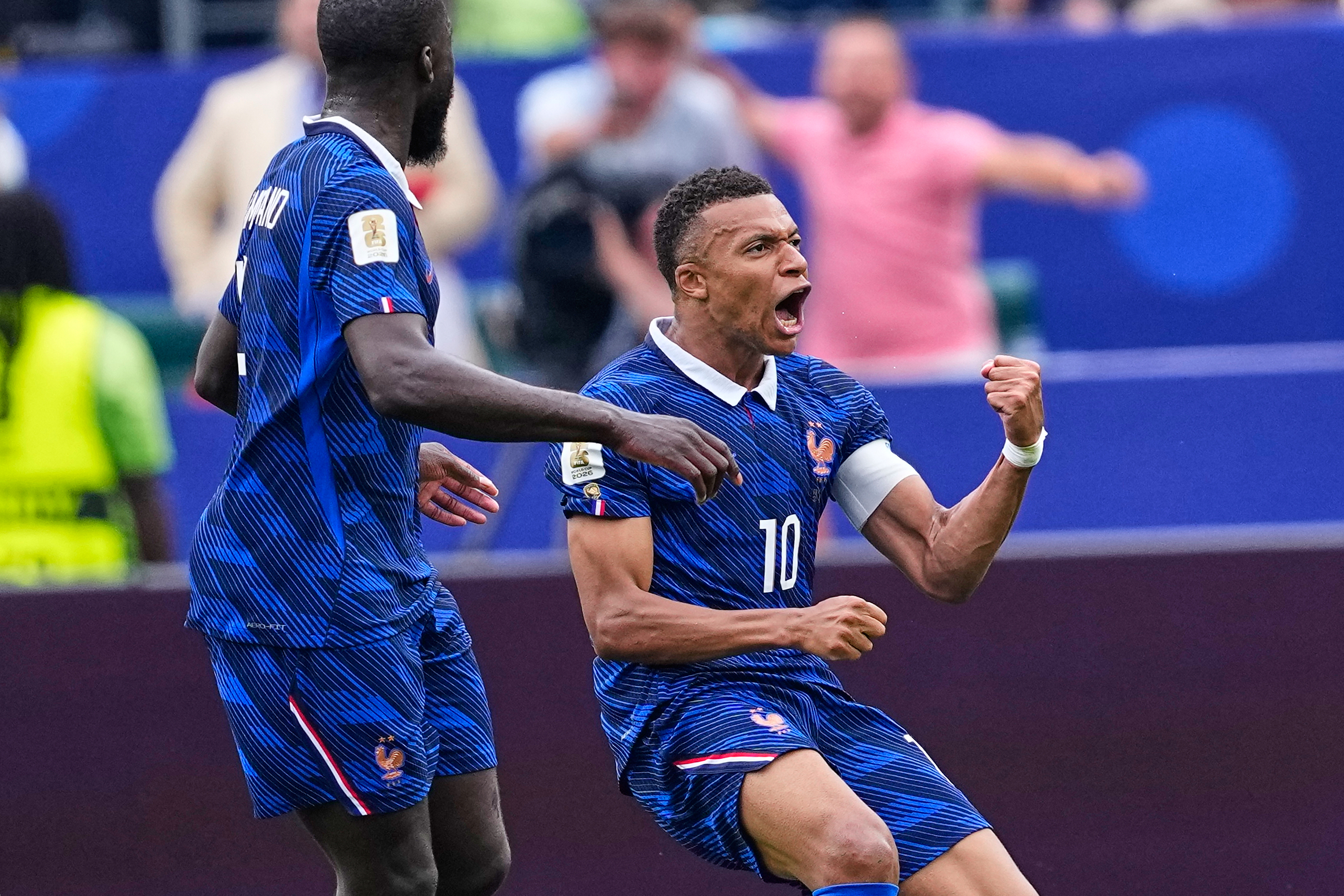 Kylian Mbappé scores 2 goals to lead France to 3-0 win over Iraq and into World Cup knockout stage