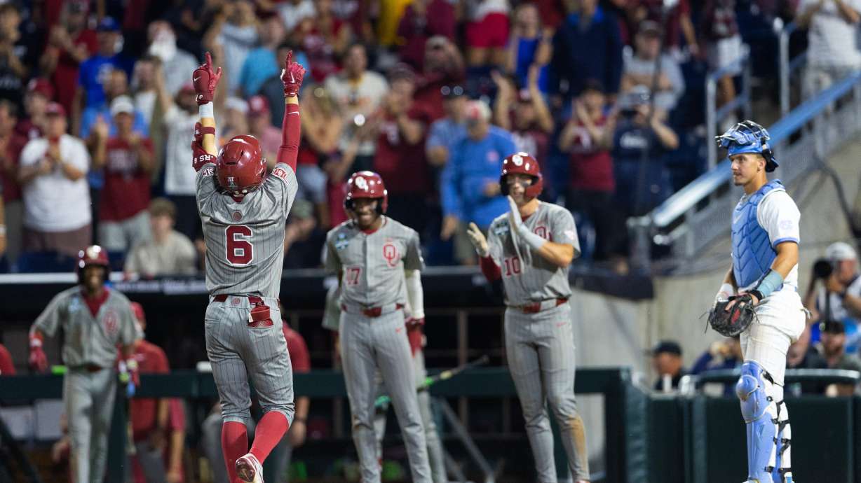 Oklahoma's Kyle Branch (6) celebrates after hitting a three-run home run against North Carolina in the eighth inning of Game 3 of the NCAA College World Series baseball finals in Omaha, Neb., Monday, June 22, 2026.